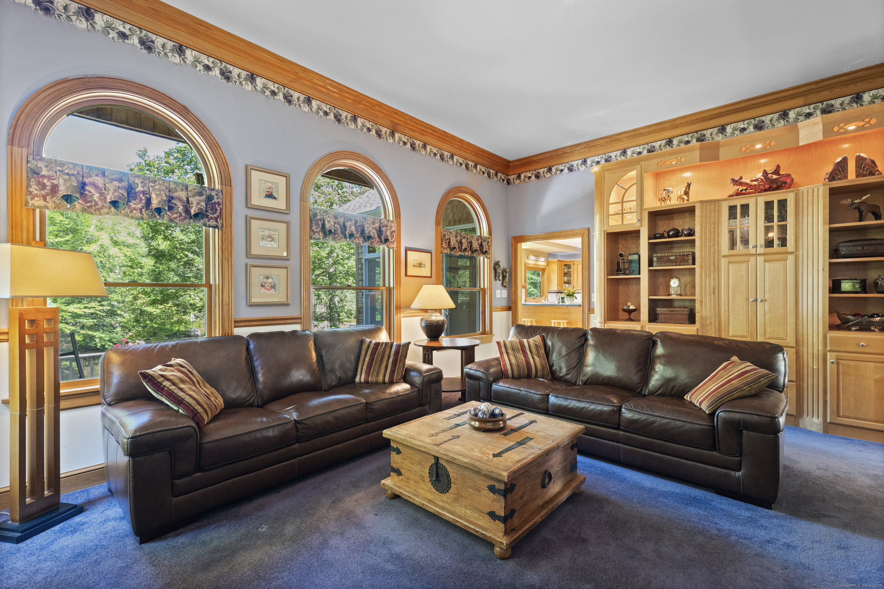 70 Morgan Road Salem, CT 06420 - Photo 11 of 38 a living room with furniture a large window and a chandelier