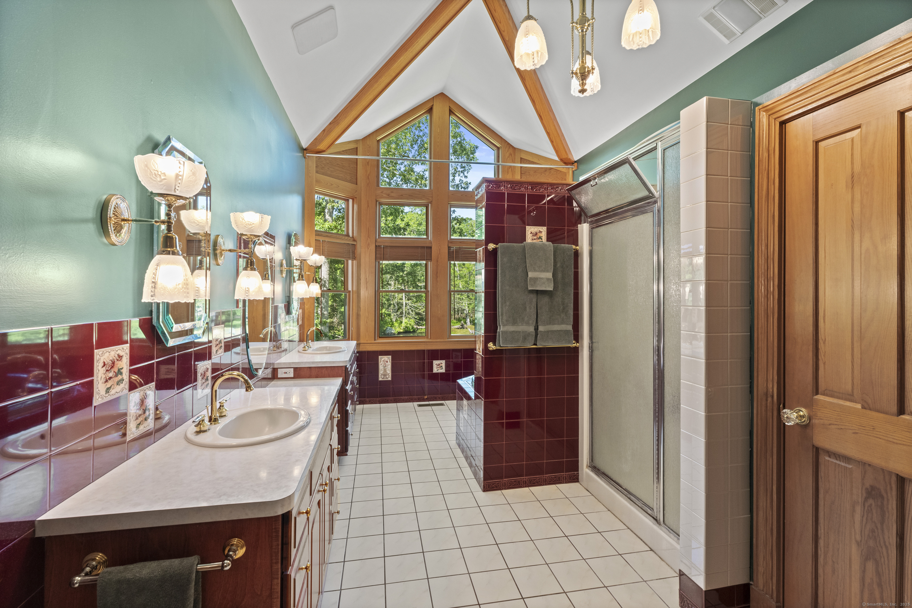 70 Morgan Road Salem, CT 06420 - Photo 17 of 38 a very nice looking room with a large window and chandelier