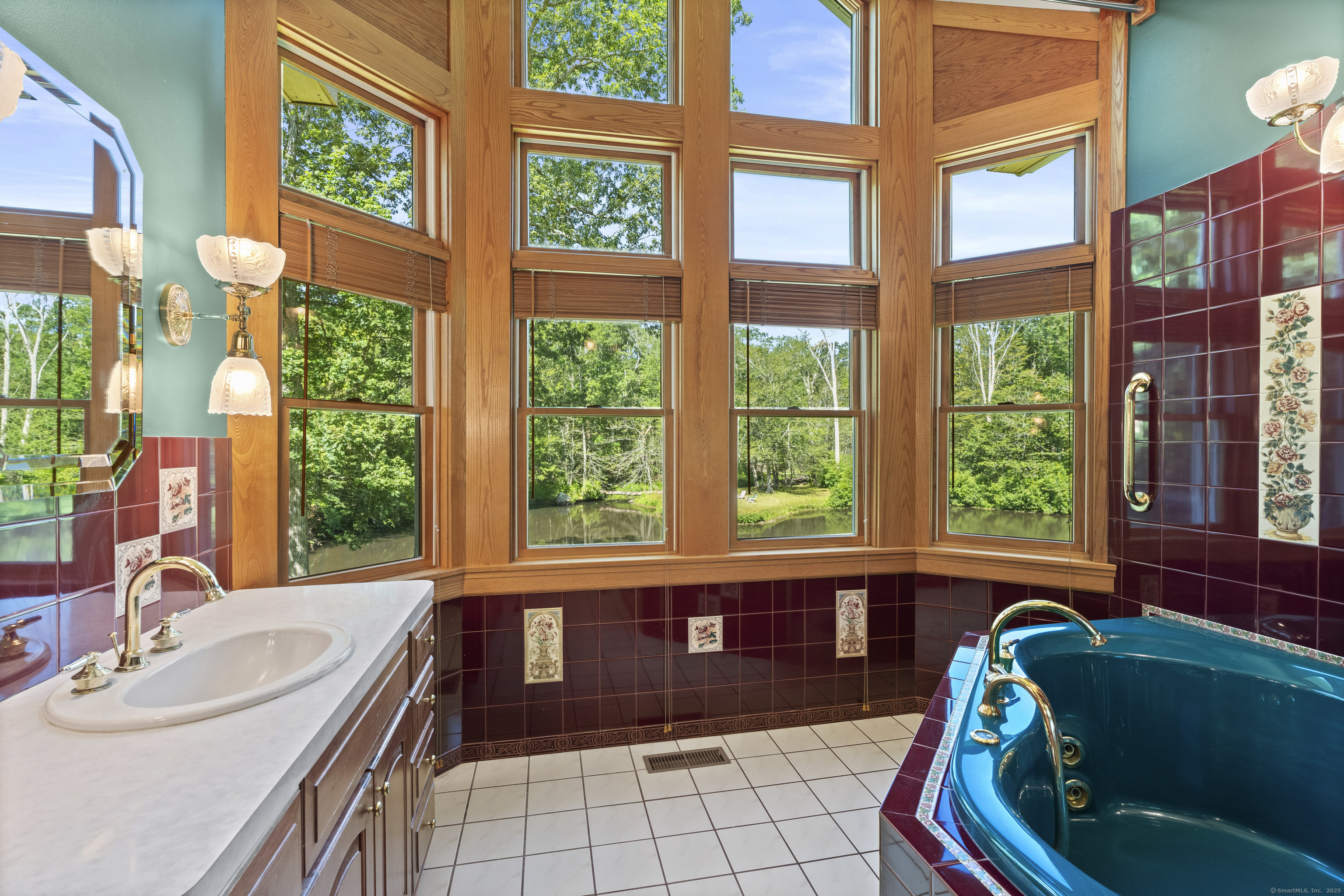 70 Morgan Road Salem, CT 06420 - Photo 18 of 38 a bath tub sitting in front of a window
