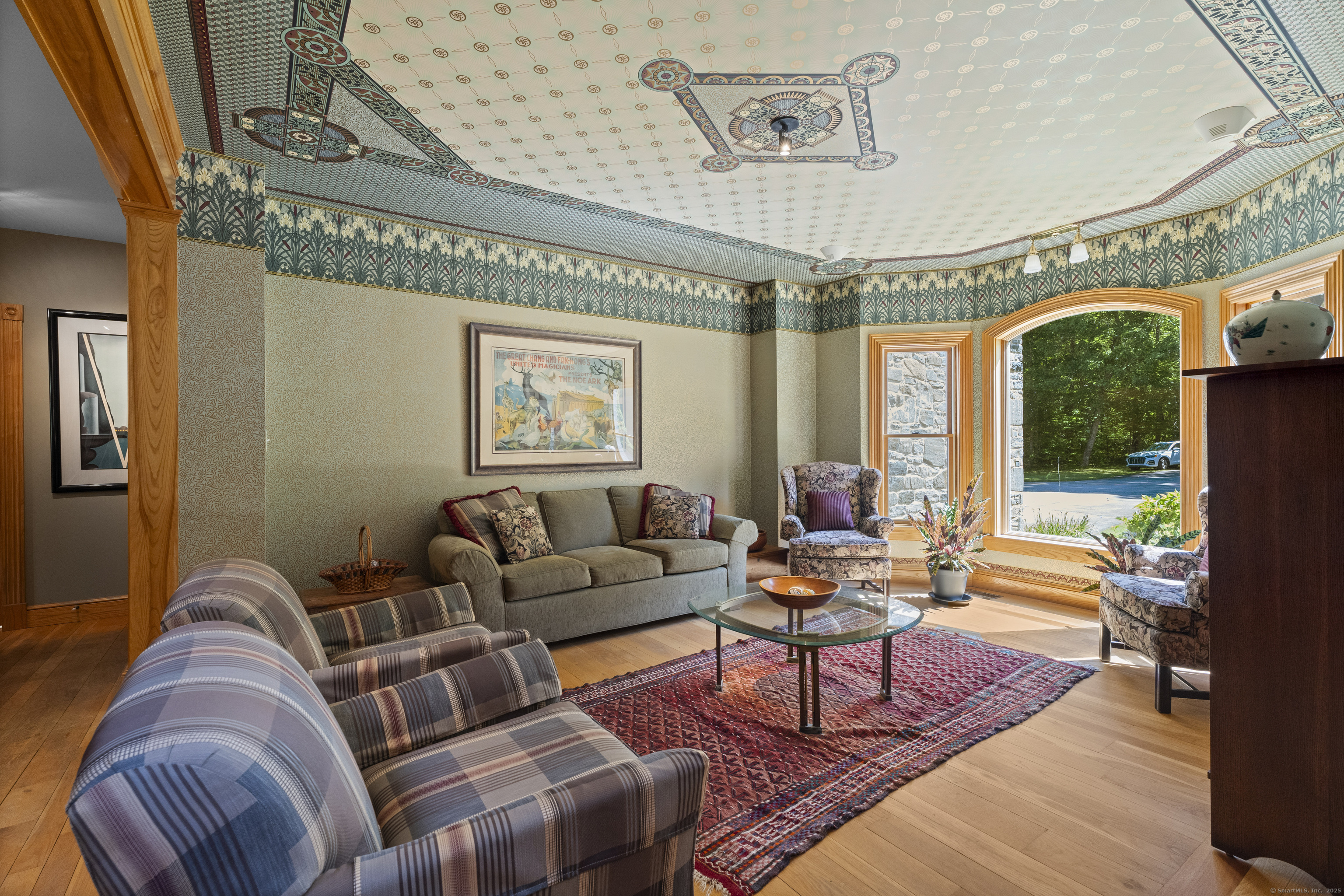 70 Morgan Road Salem, CT 06420 - Photo 5 of 38 a living room with furniture and a chandelier