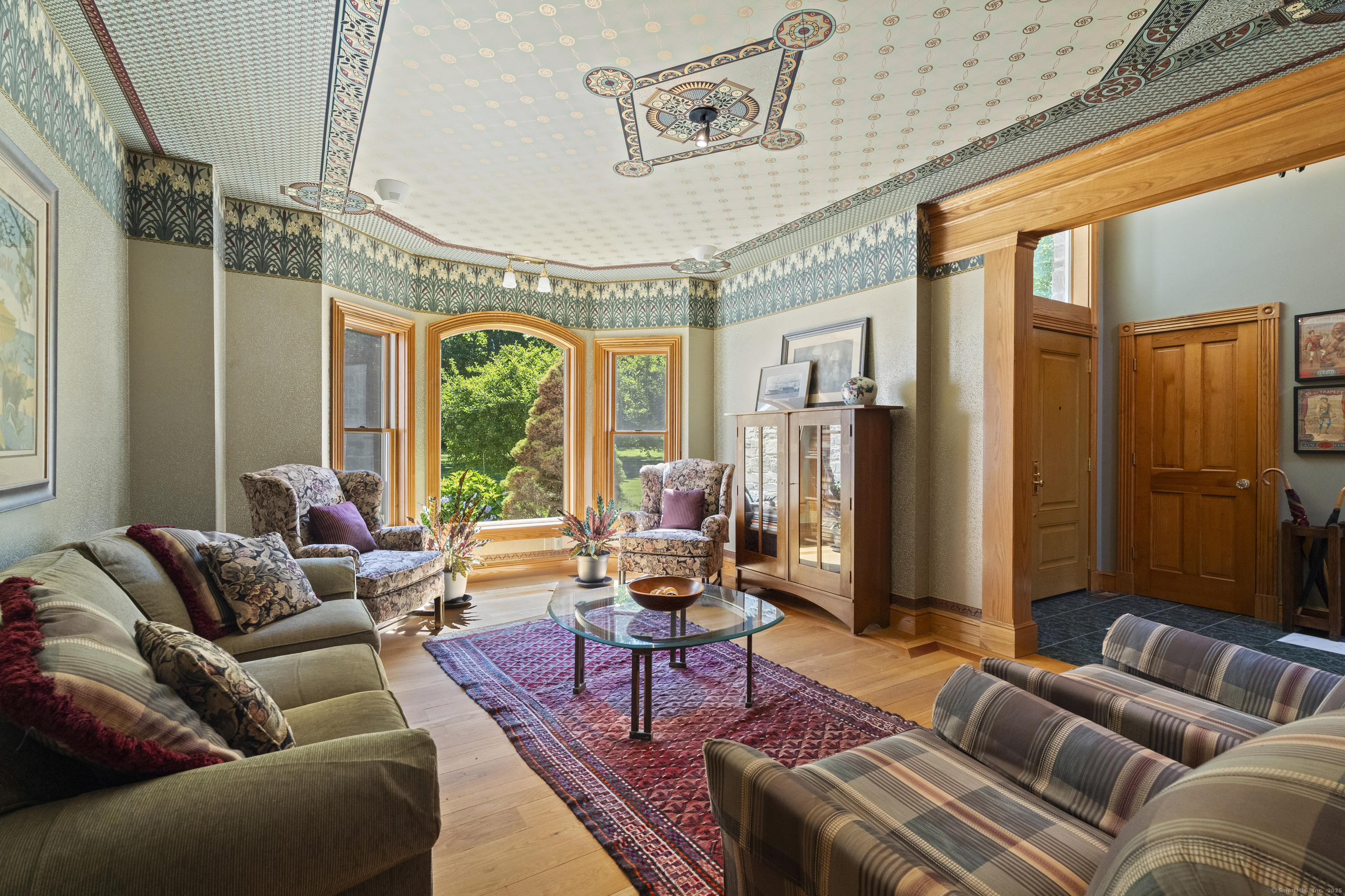 70 Morgan Road Salem, CT 06420 - Photo 6 of 38 a living room with furniture ceiling fan and a rug