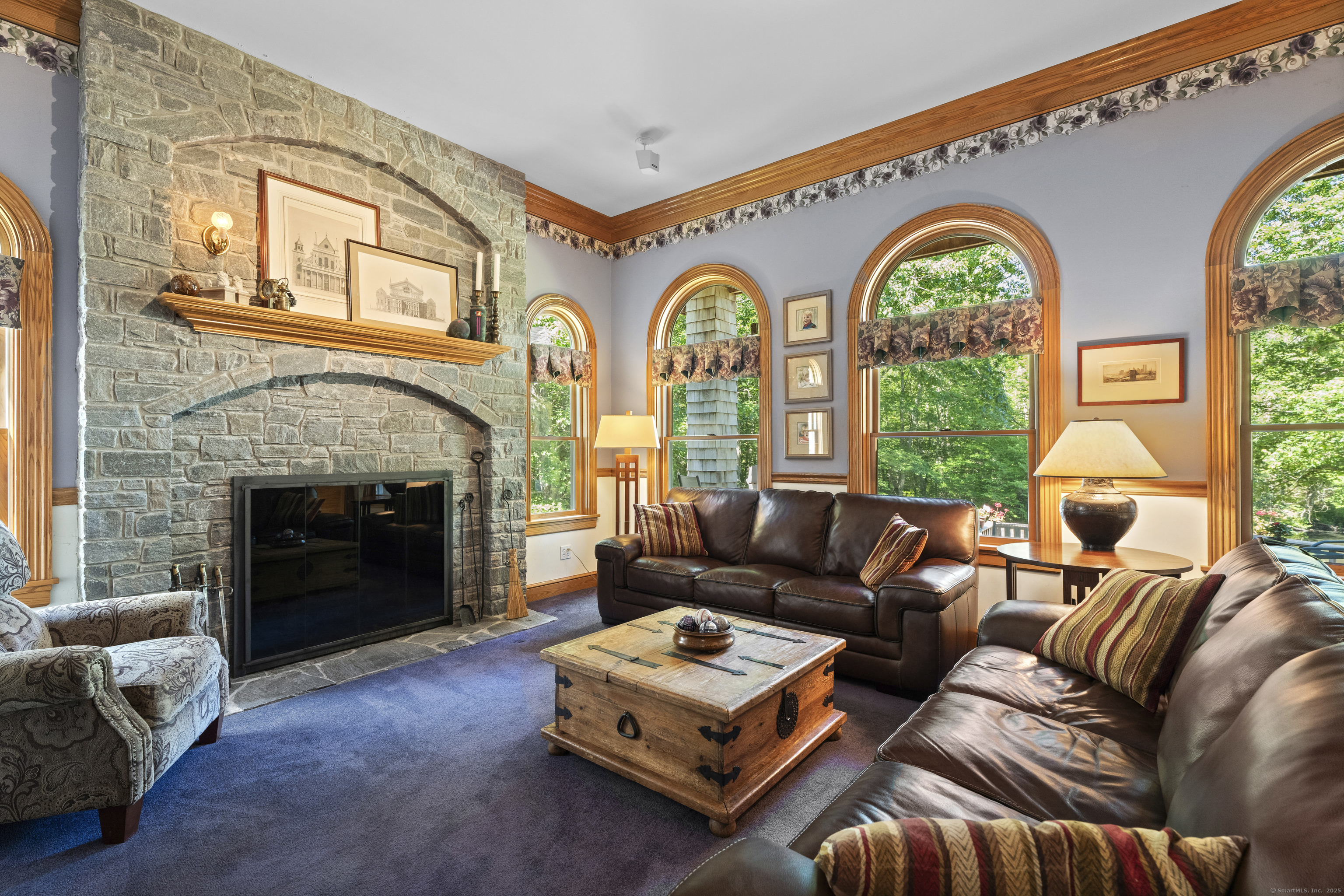 70 Morgan Road Salem, CT 06420 - Photo 10 of 38 a living room with furniture and a fireplace