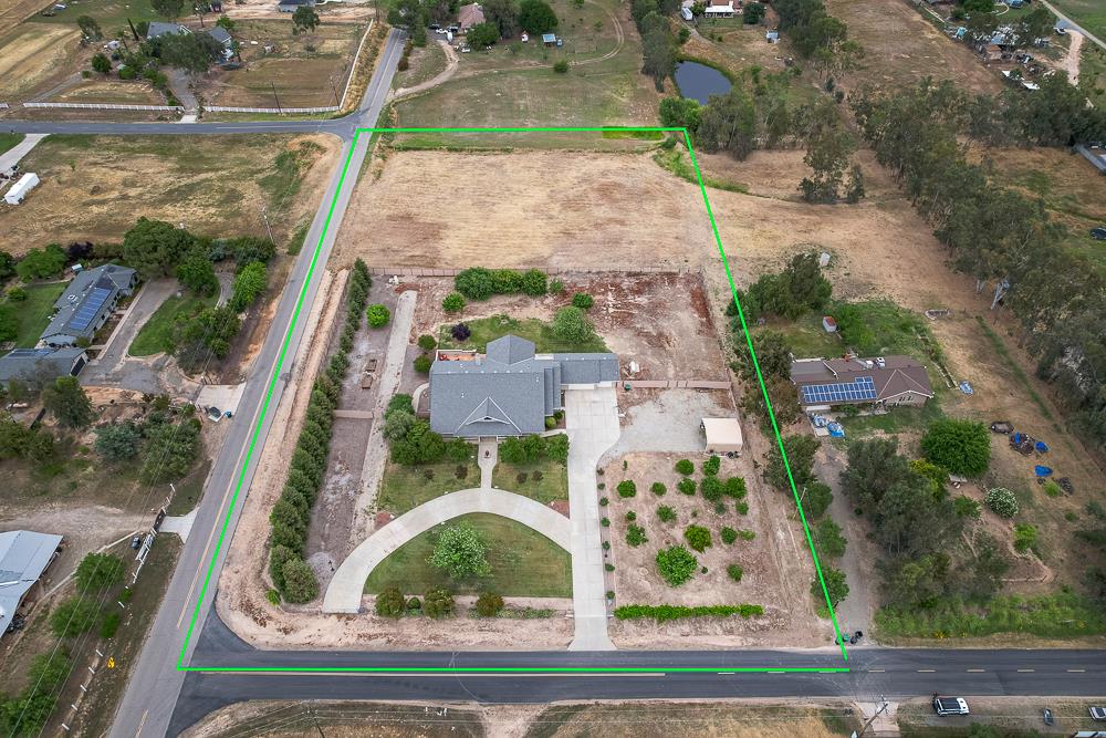 17465 Monreal Road Madera, CA 93636 - Photo 50 of 59 an aerial view of a house with a yard