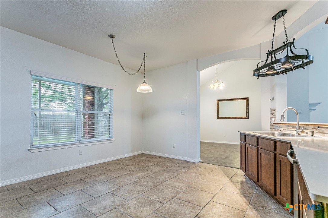 7810 Redbrush Temple, TX 76502 - Photo 9 of 30 kitchen with breakfast area and open to formal dining room