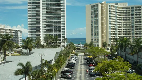 a view of a city with tall buildings