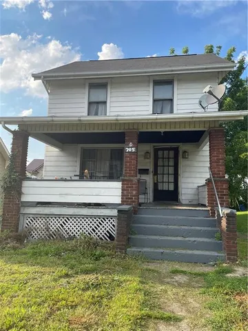 a view of a house with a balcony