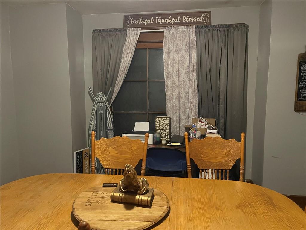 705 East Lutton Street New Castle, PA 16101 - Photo 11 of 23 a living room with furniture and a window