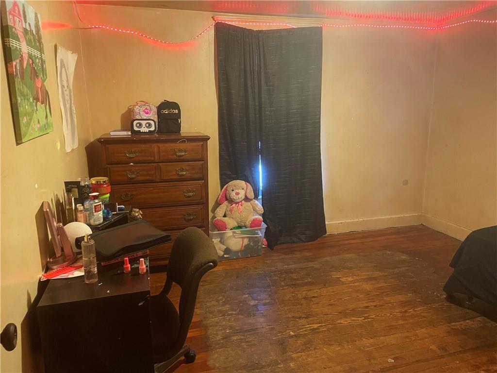705 East Lutton Street New Castle, PA 16101 - Photo 17 of 23 a bedroom with a bed and a dresser