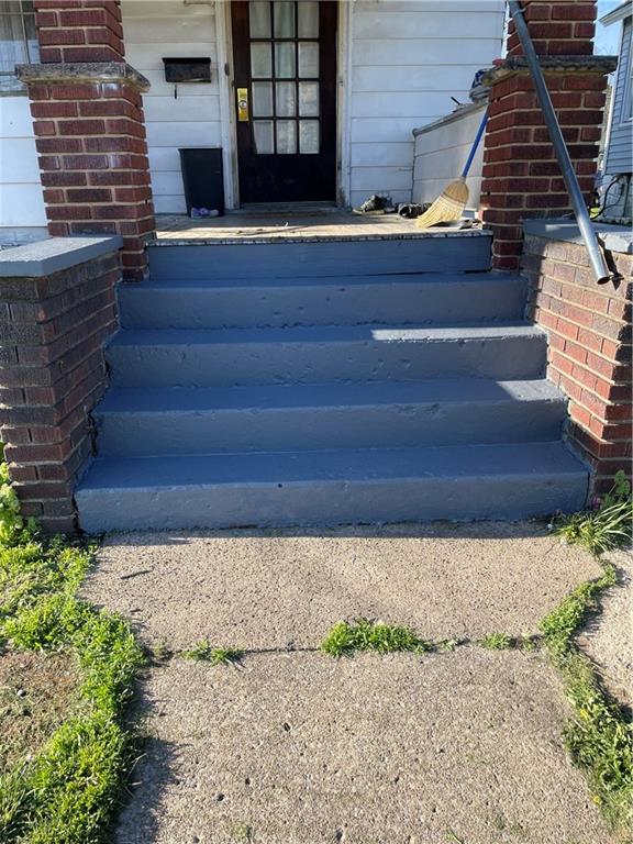 705 East Lutton Street New Castle, PA 16101 - Photo 5 of 23 a front view of a house with a yard