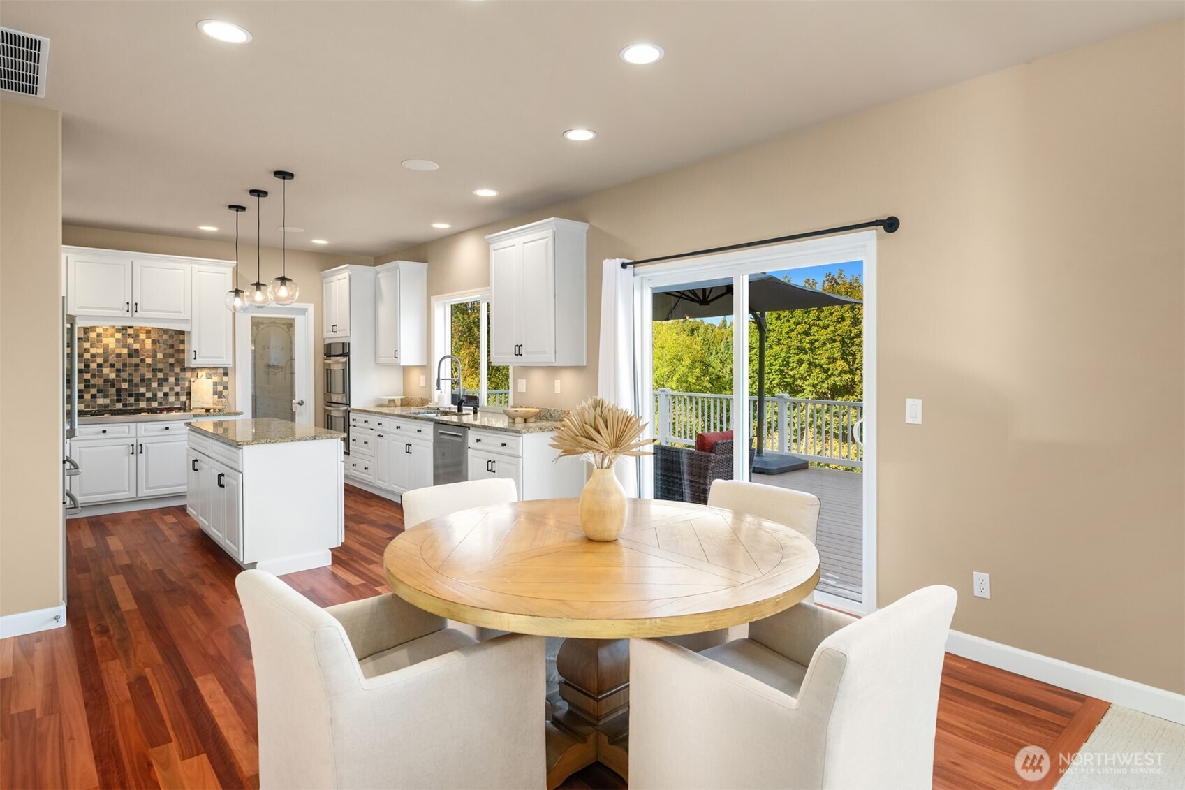 3129 115th Avenue Southeast Snohomish, WA 98290 - Photo 11 of 40 a dining room with furniture and a large window