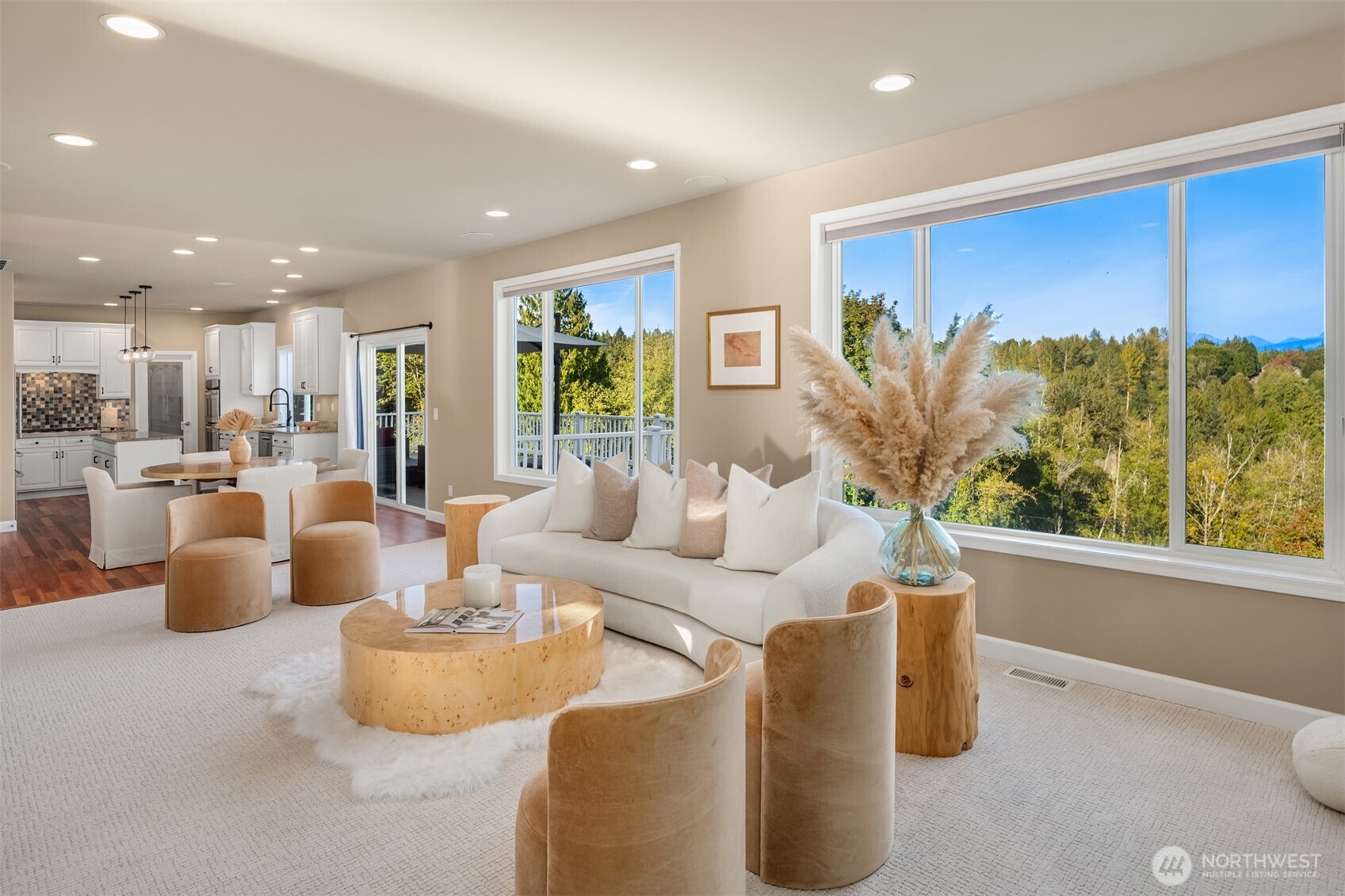 3129 115th Avenue Southeast Snohomish, WA 98290 - Photo 12 of 40 a living room with furniture a window and a kitchen view