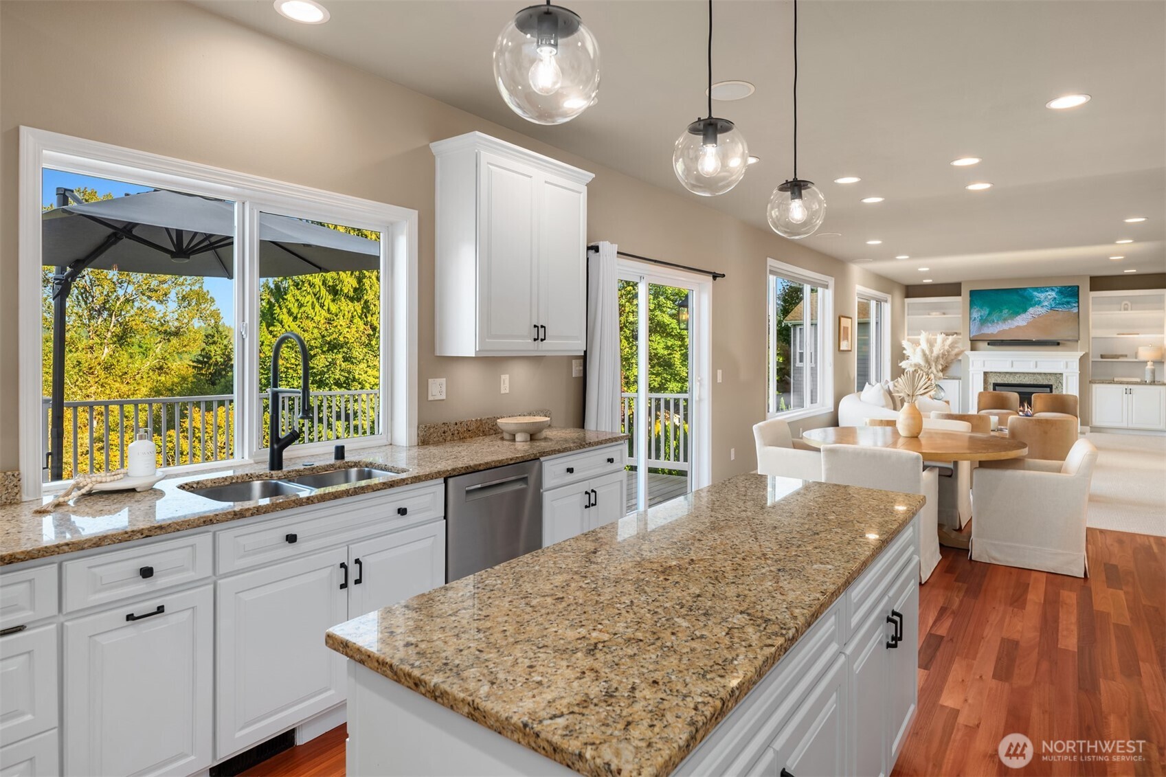 3129 115th Avenue Southeast Snohomish, WA 98290 - Photo 14 of 40 a large kitchen with kitchen island a large island in it