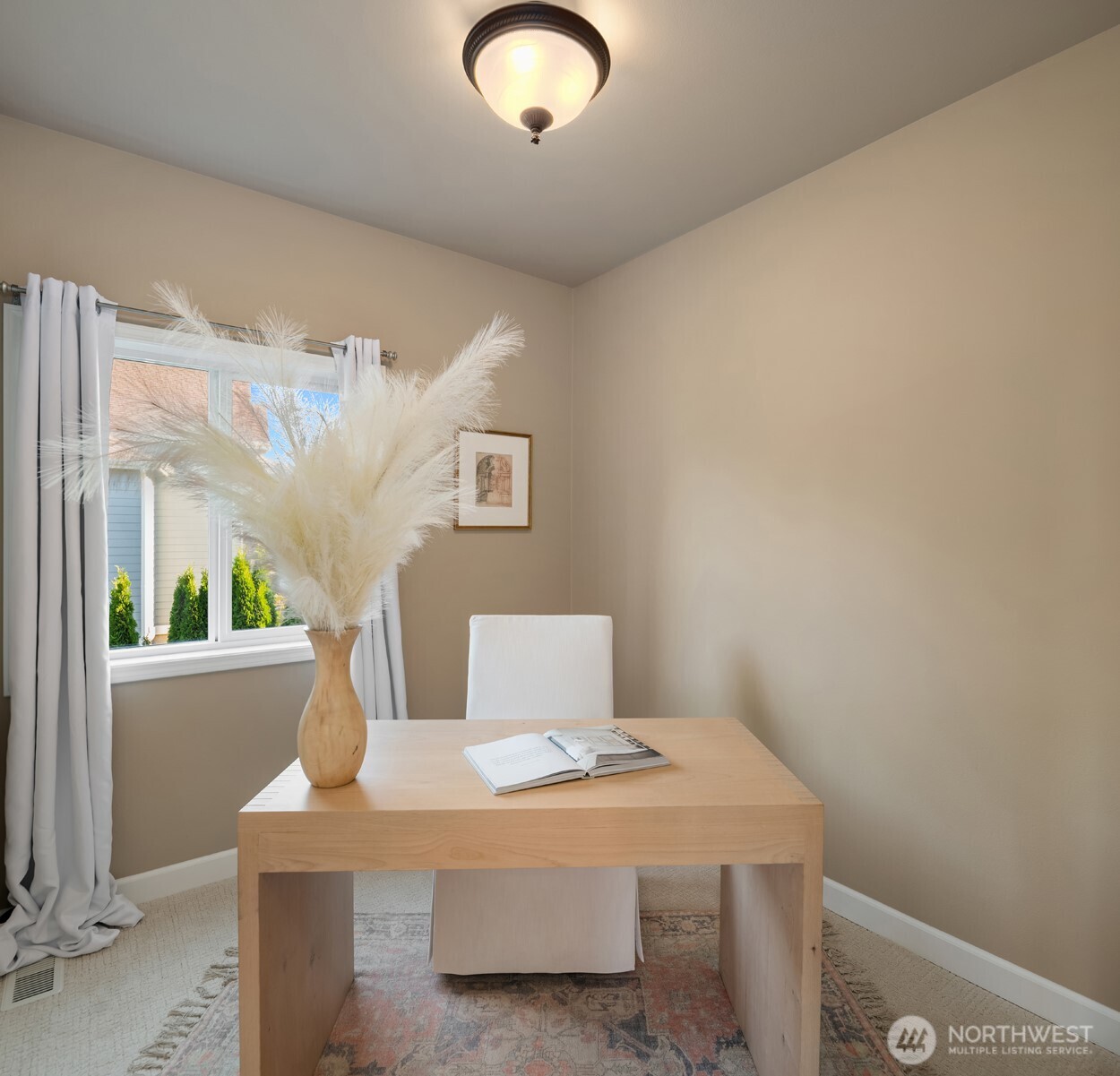 3129 115th Avenue Southeast Snohomish, WA 98290 - Photo 15 of 40 a view of a room with a table and chair