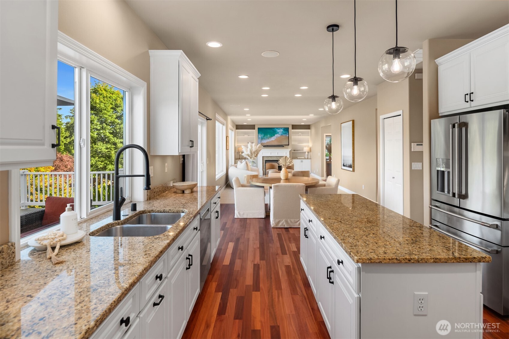 3129 115th Avenue Southeast Snohomish, WA 98290 - Photo 16 of 40 a large kitchen with granite countertop a large counter top appliances and cabinets