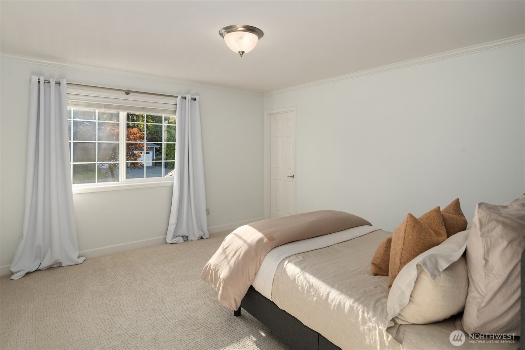 3129 115th Avenue Southeast Snohomish, WA 98290 - Photo 22 of 40 a bedroom with a bed and a window
