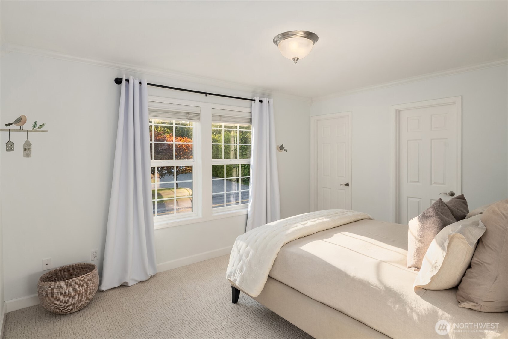 3129 115th Avenue Southeast Snohomish, WA 98290 - Photo 24 of 40 a bedroom with a bed and a window
