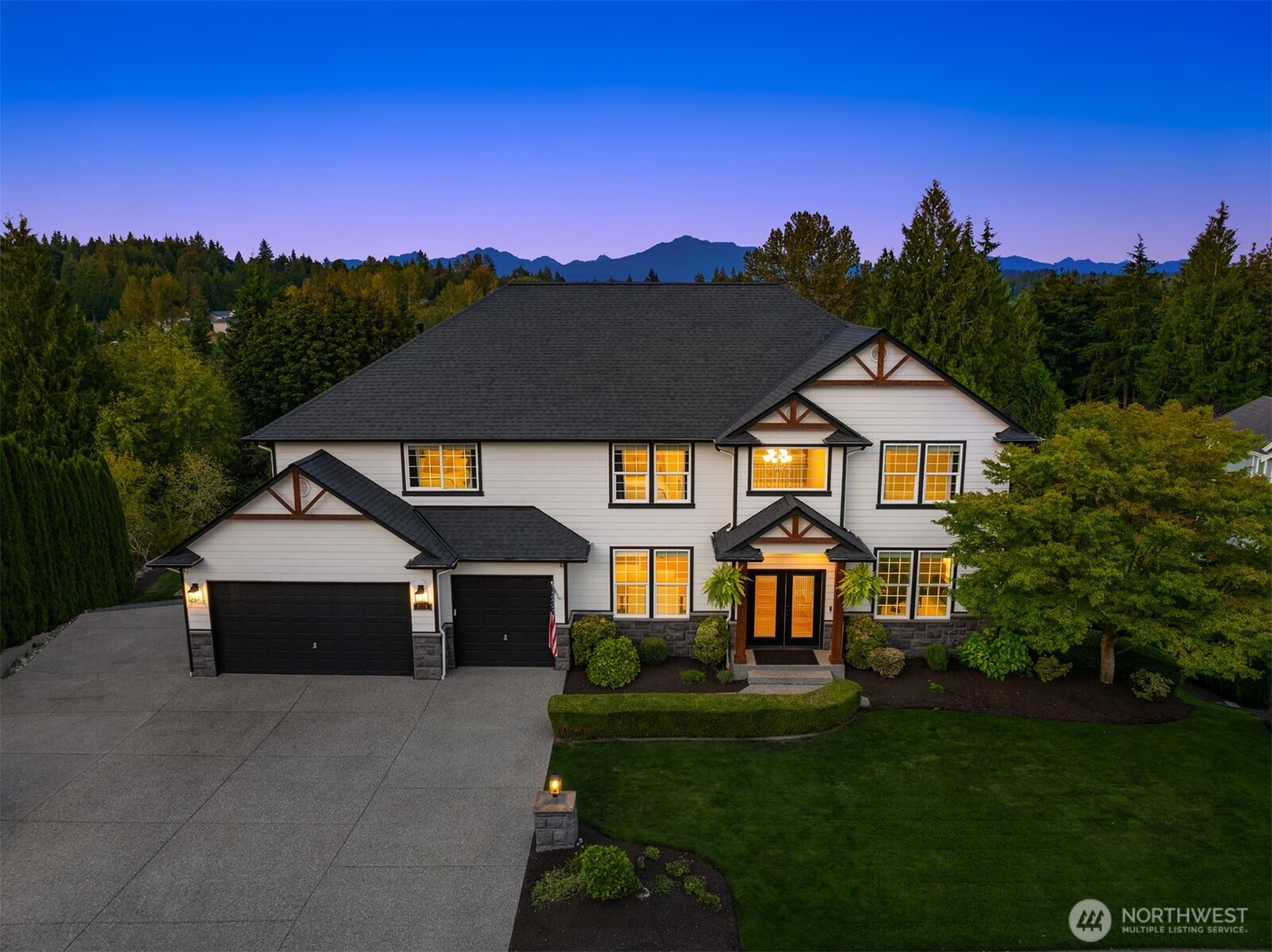 3129 115th Avenue Southeast Snohomish, WA 98290 - Photo 3 of 40 a front view of a house with a yard