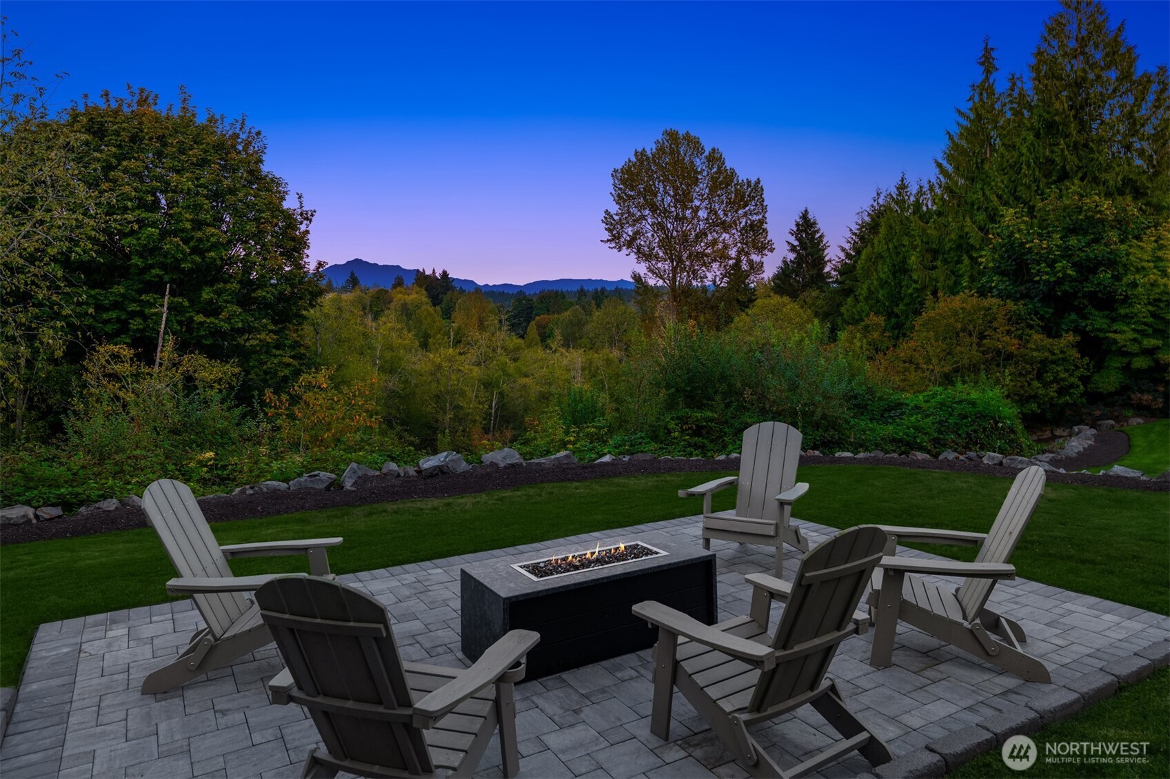 3129 115th Avenue Southeast Snohomish, WA 98290 - Photo 31 of 40 a view of a chairs and table in the garden