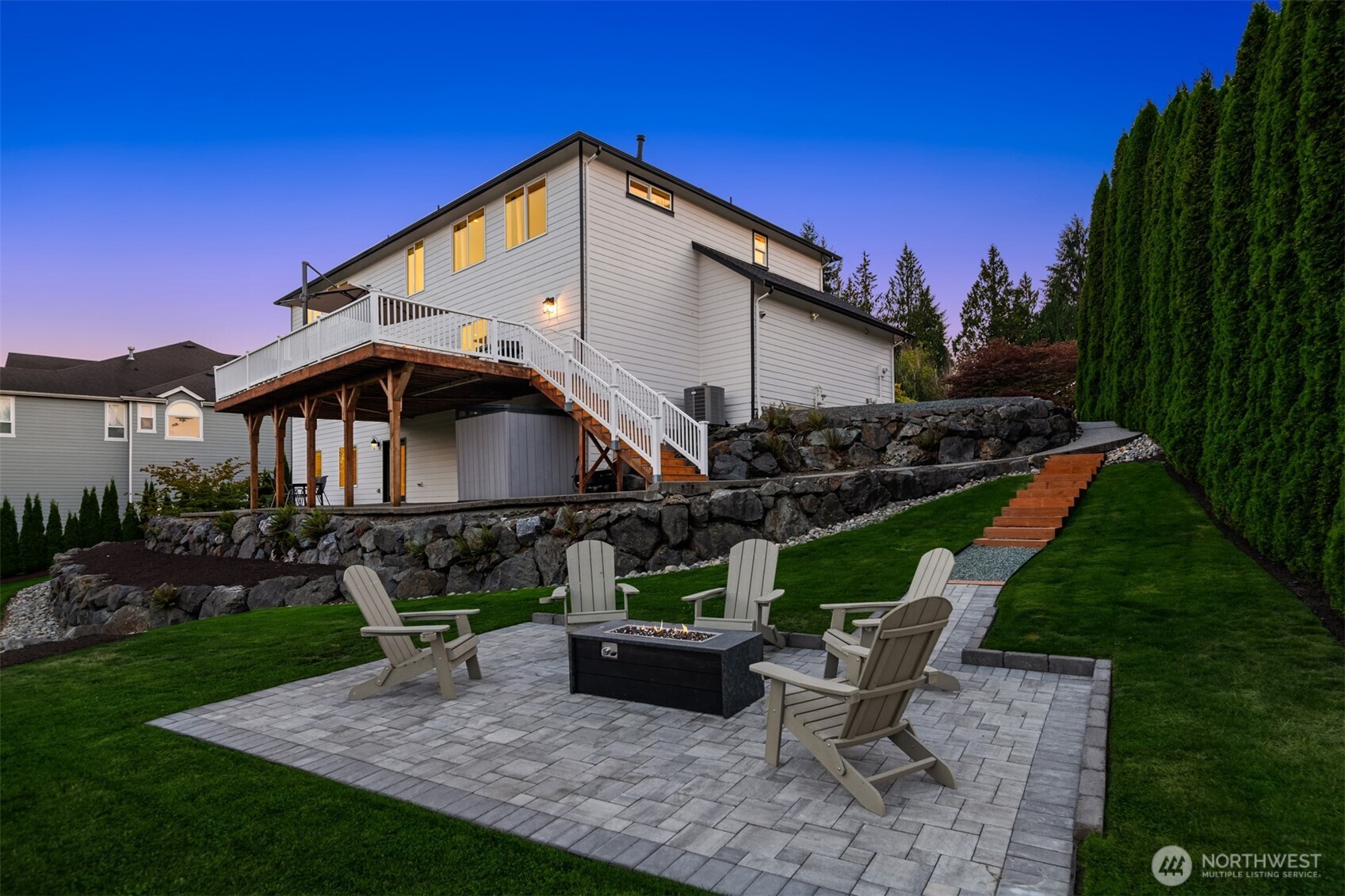 3129 115th Avenue Southeast Snohomish, WA 98290 - Photo 32 of 40 a front view of a house with garden and sitting area