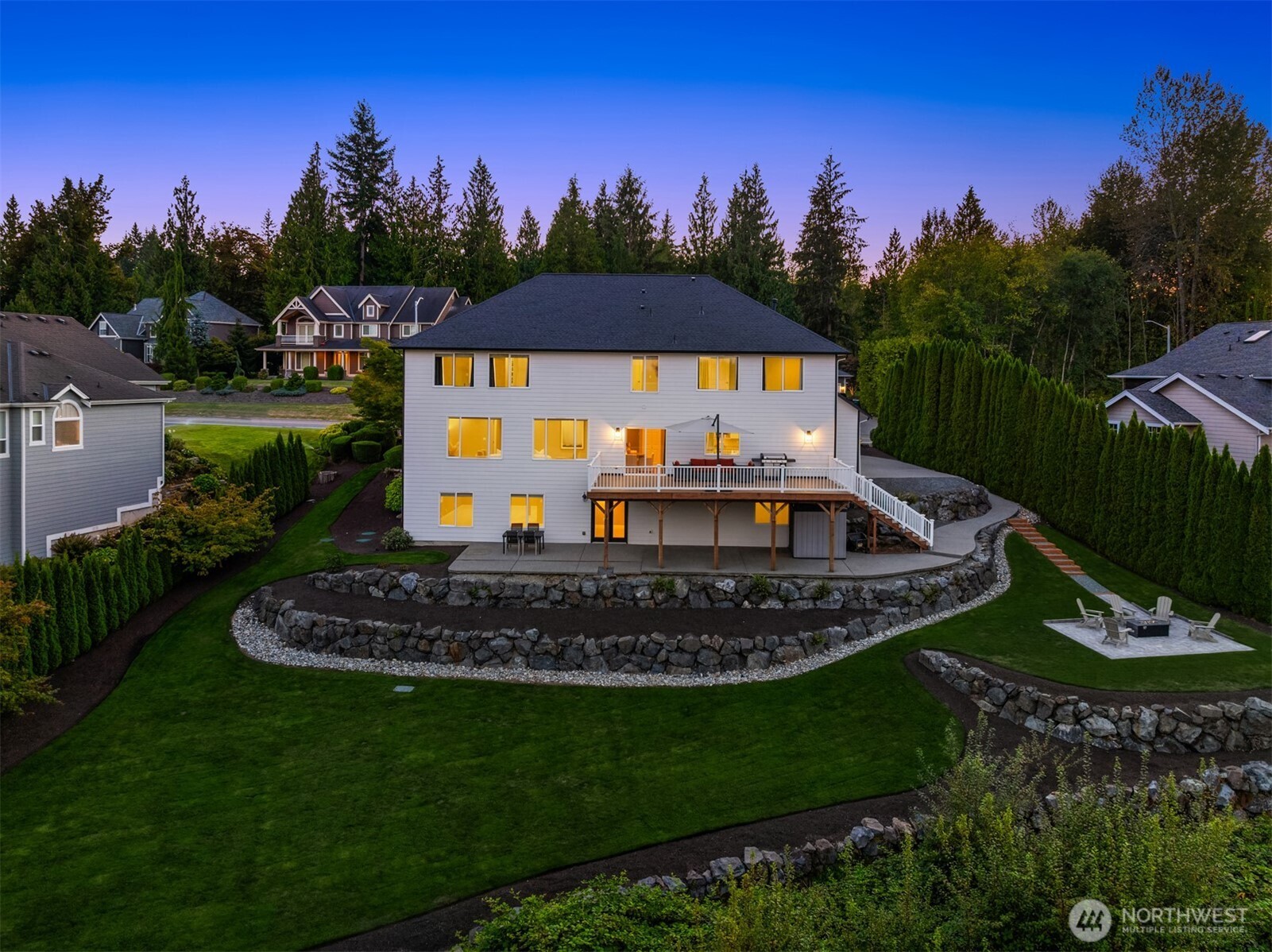 3129 115th Avenue Southeast Snohomish, WA 98290 - Photo 35 of 40 a view of a house with a yard and potted plants