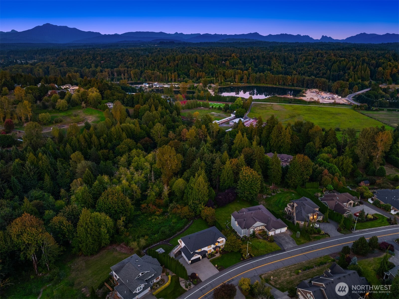 3129 115th Avenue Southeast Snohomish, WA 98290 - Photo 39 of 40 a view of a city with sunset view