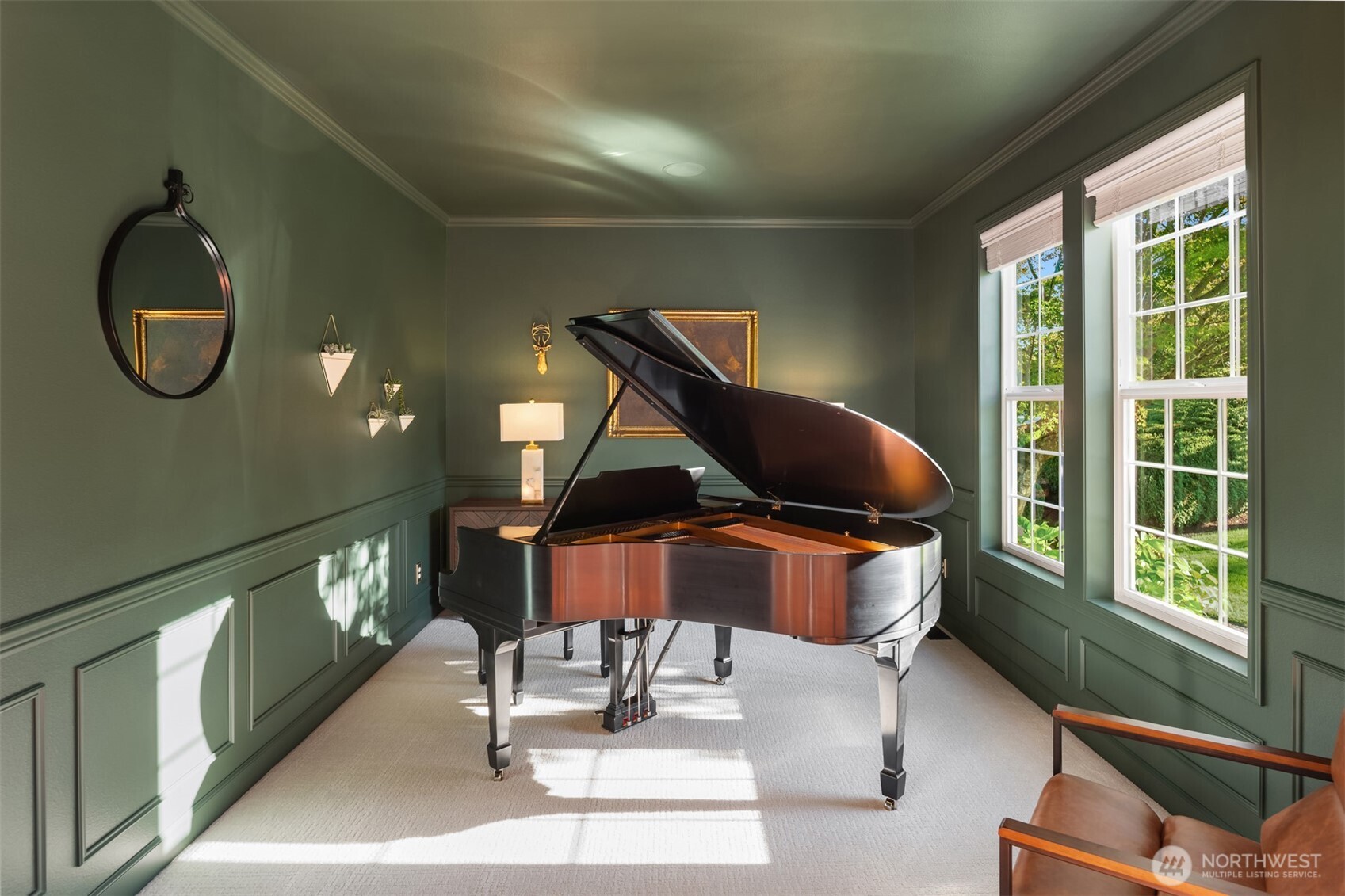 3129 115th Avenue Southeast Snohomish, WA 98290 - Photo 6 of 40 a living room with a floor to ceiling window and furniture