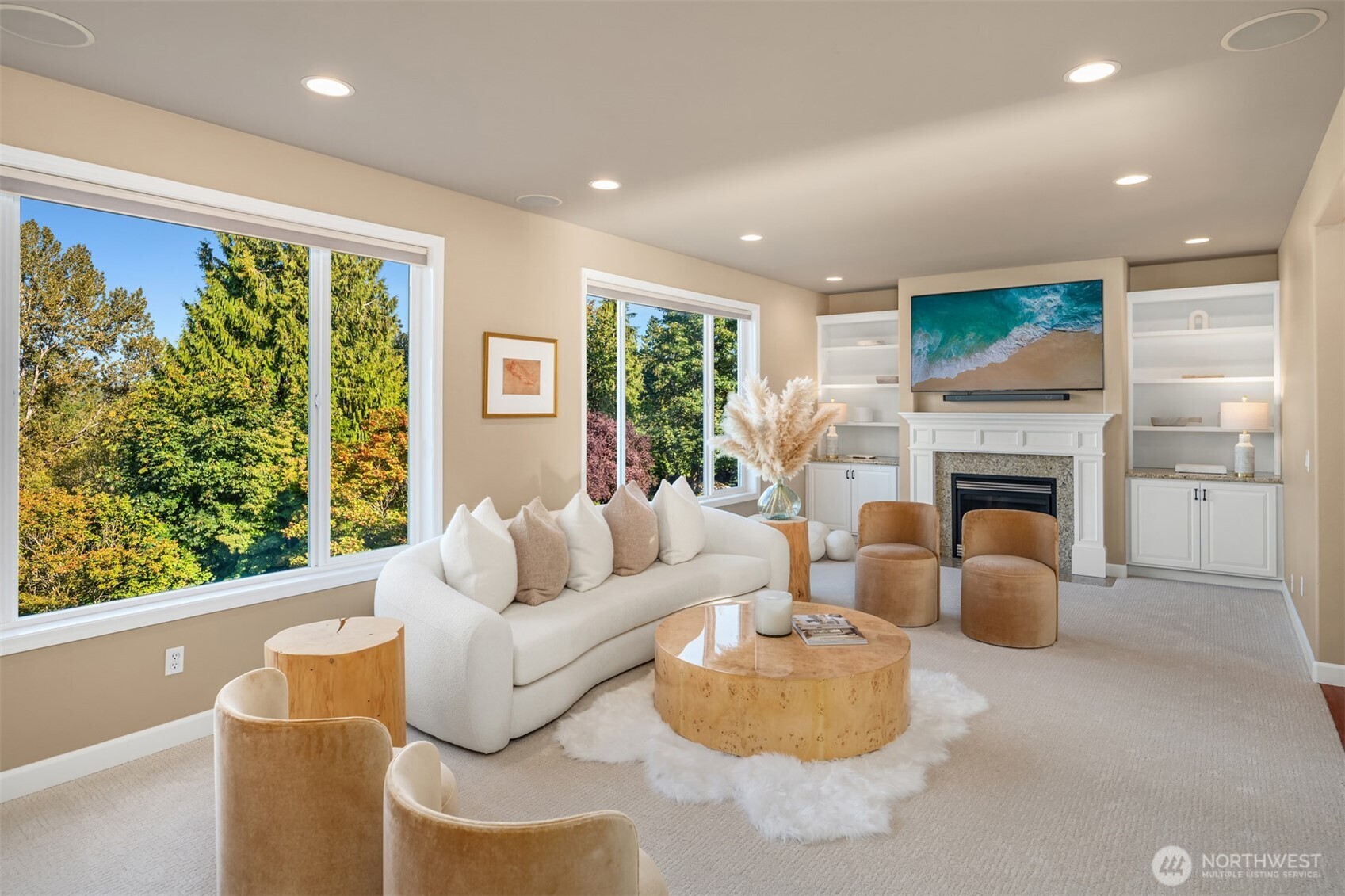 3129 115th Avenue Southeast Snohomish, WA 98290 - Photo 8 of 40 a living room with furniture a fireplace and a flat screen tv