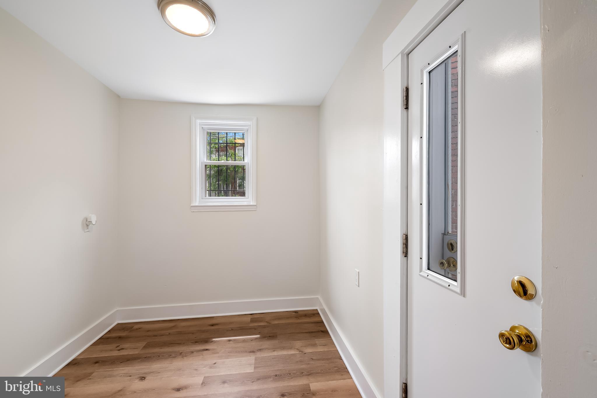 3003 Kentucky Avenue Baltimore, MD 21213 - Photo 15 of 32 a view of an empty room with a window