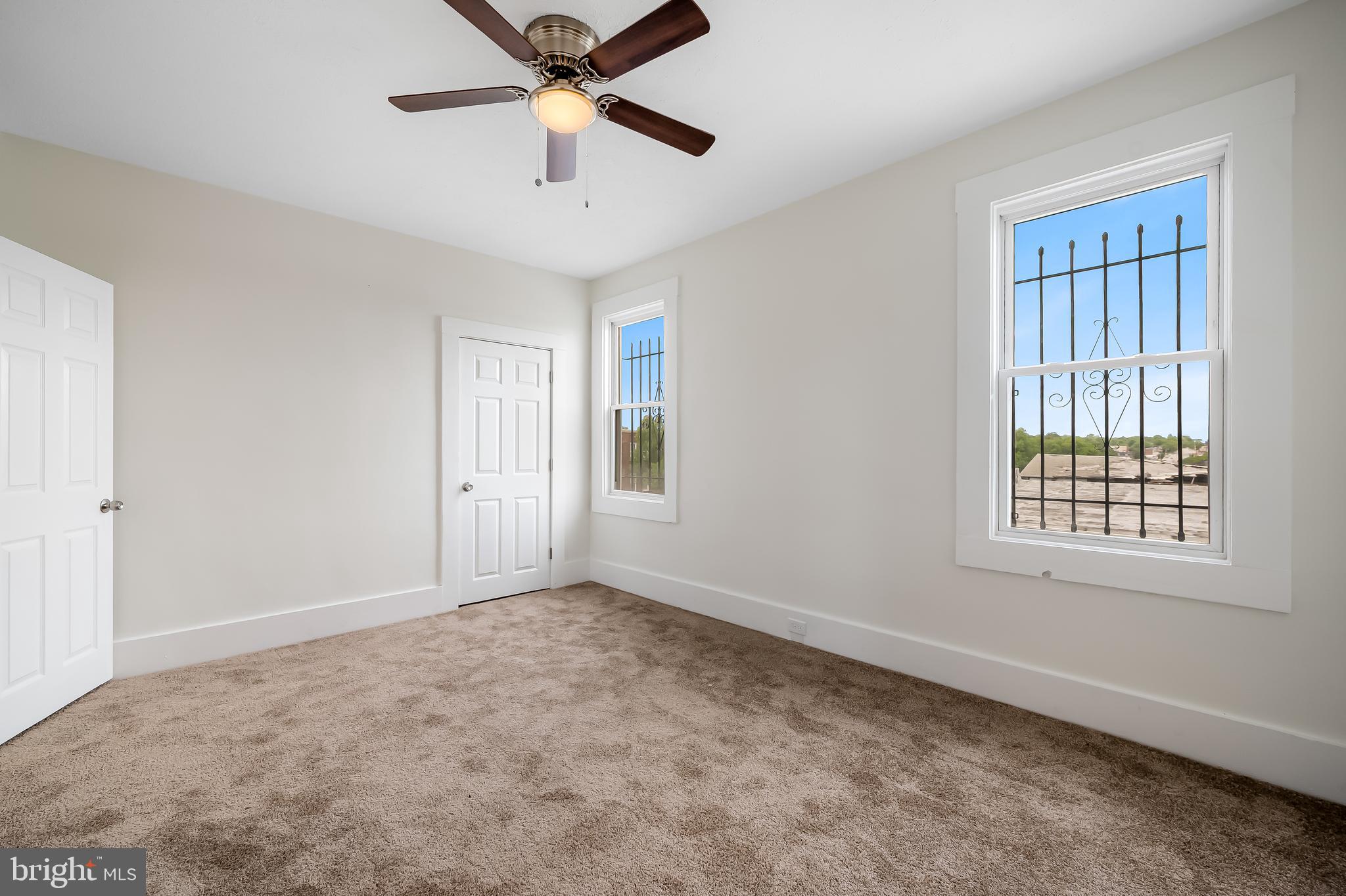 3003 Kentucky Avenue Baltimore, MD 21213 - Photo 18 of 32 a view of an empty room with a window