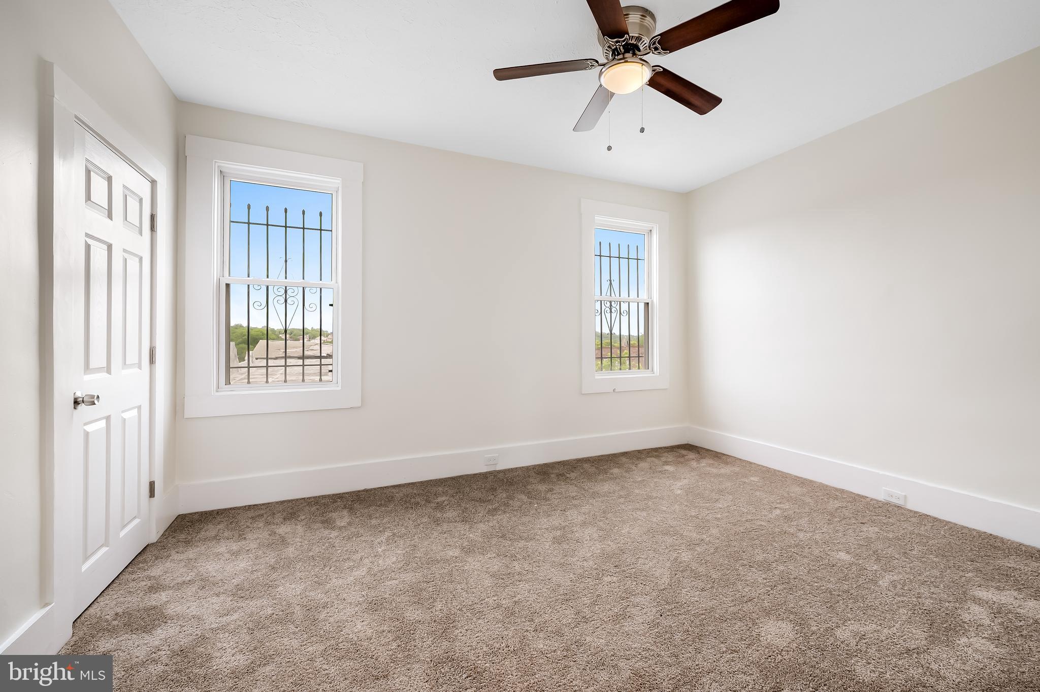 3003 Kentucky Avenue Baltimore, MD 21213 - Photo 19 of 32 a view of an empty room with a window