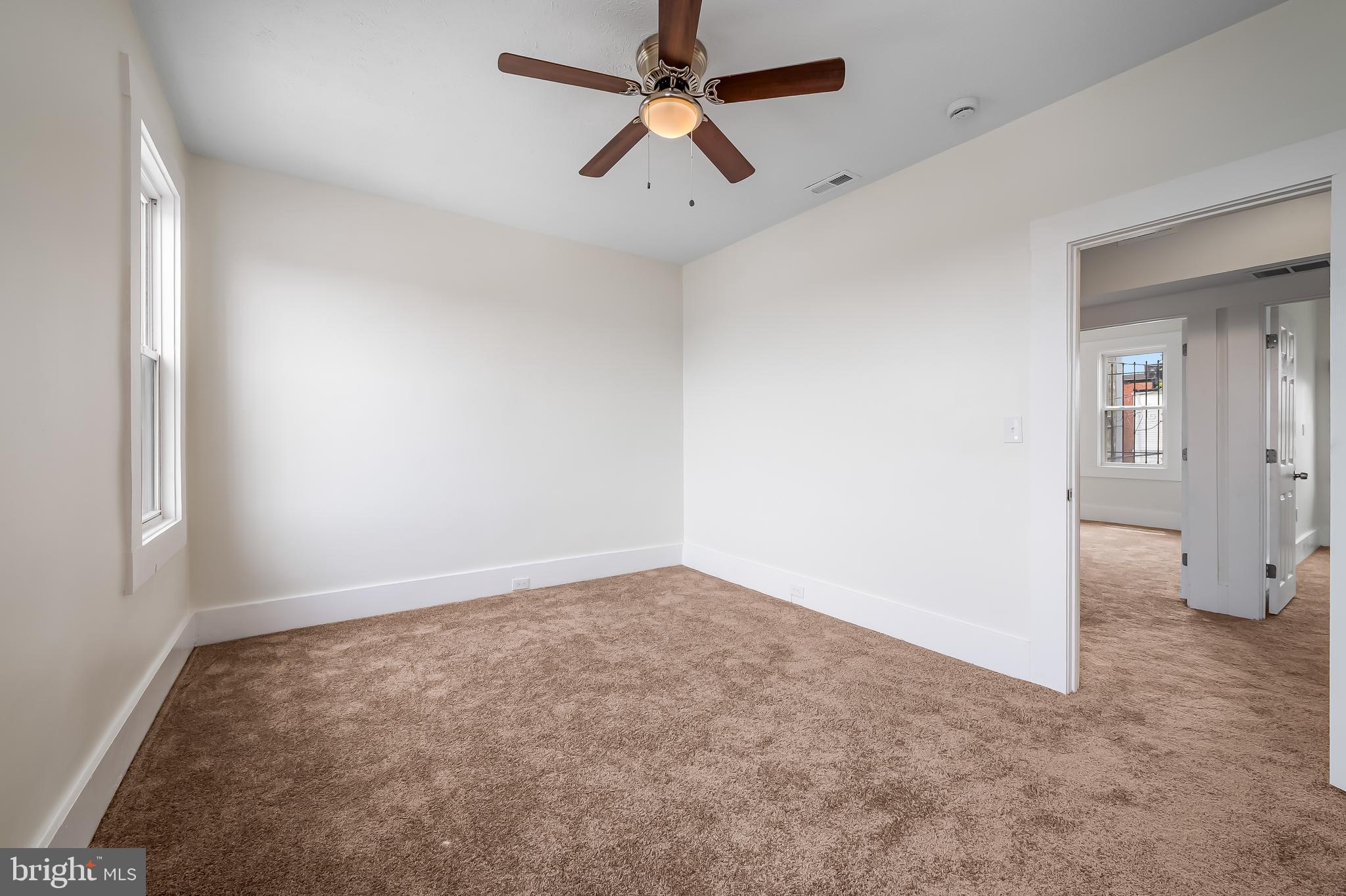 3003 Kentucky Avenue Baltimore, MD 21213 - Photo 20 of 32 wooden floor in an empty room