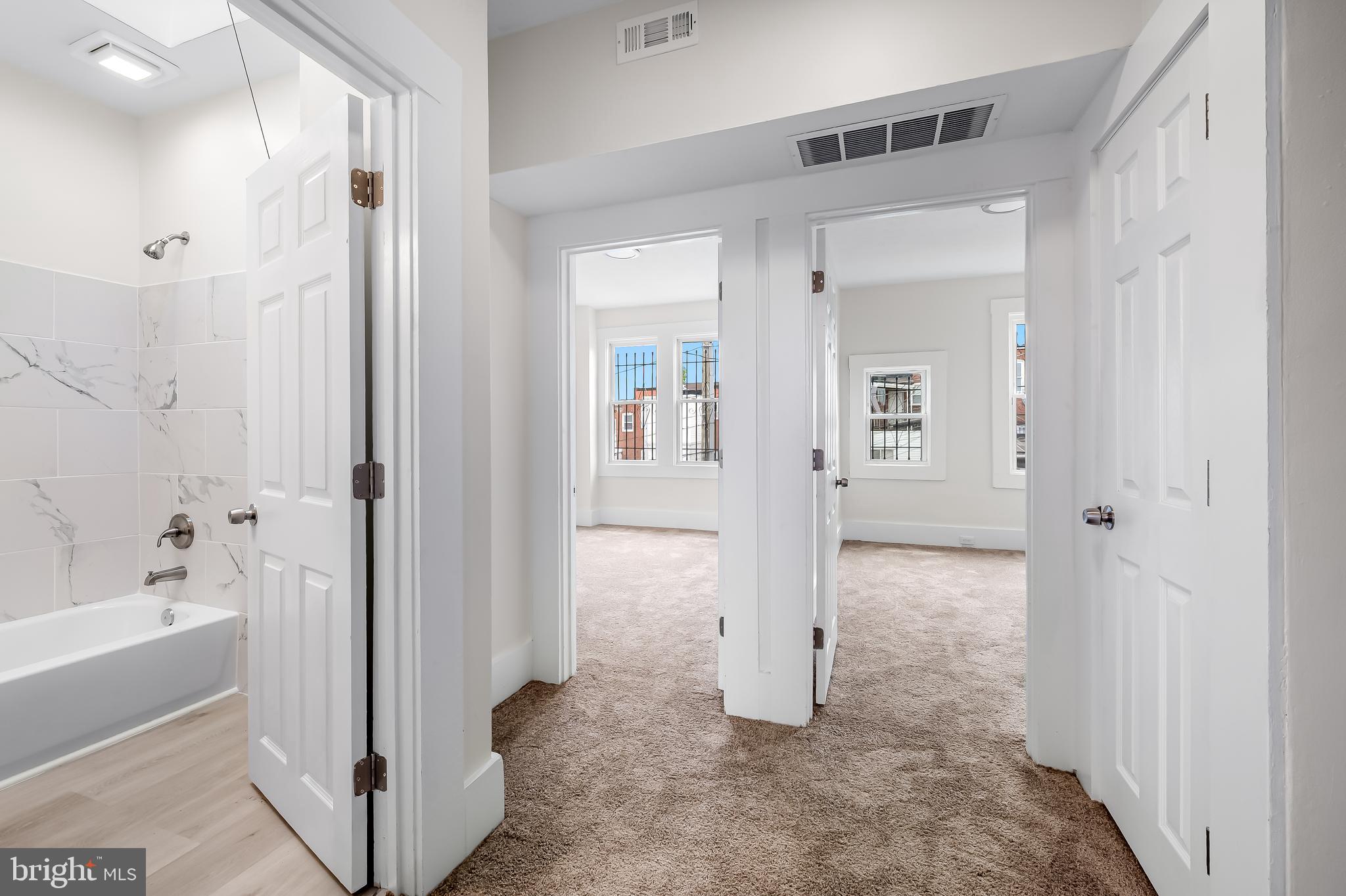 3003 Kentucky Avenue Baltimore, MD 21213 - Photo 21 of 32 a view of a bathroom with a tub and shower