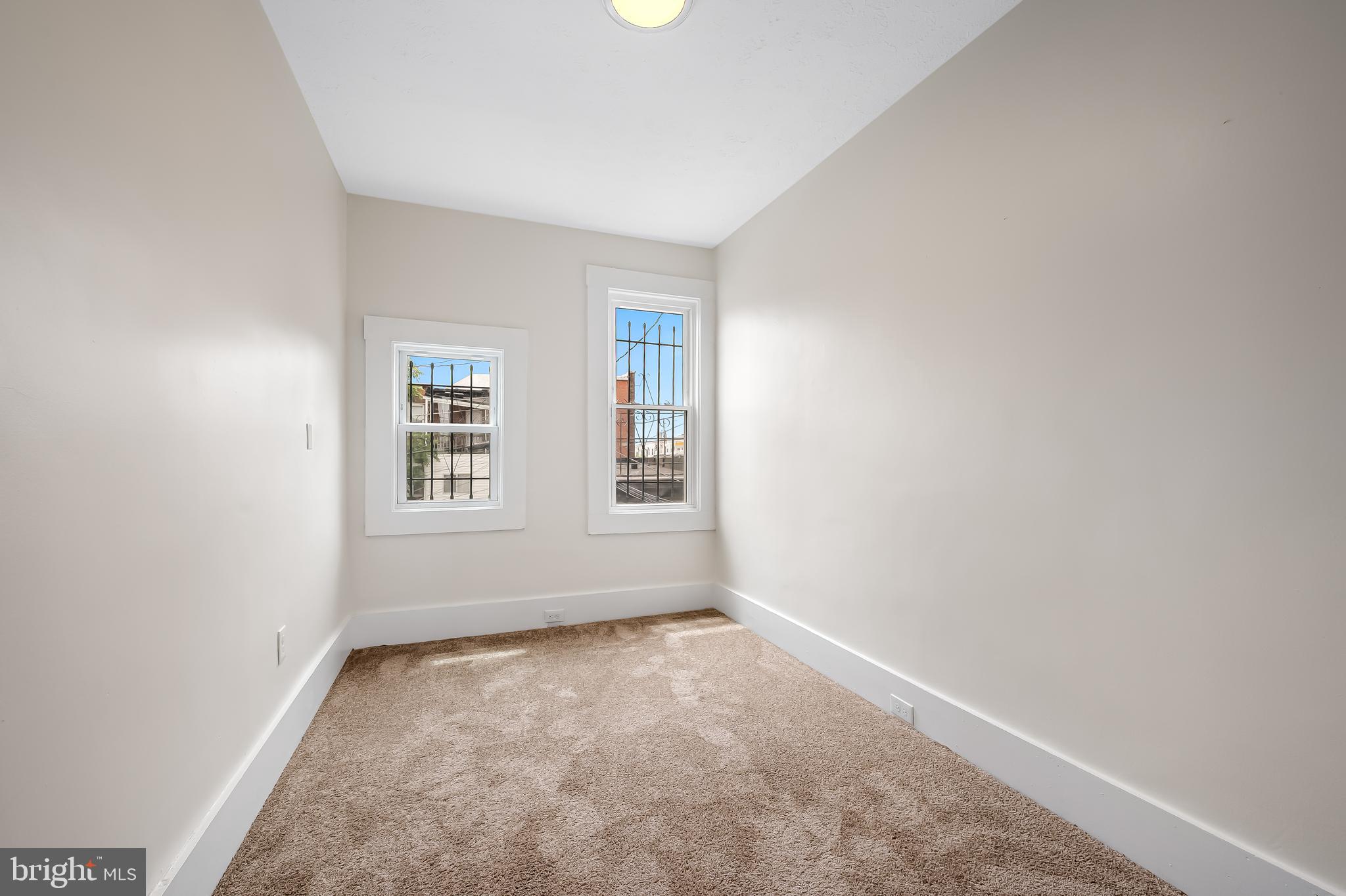 3003 Kentucky Avenue Baltimore, MD 21213 - Photo 25 of 32 an empty room with windows