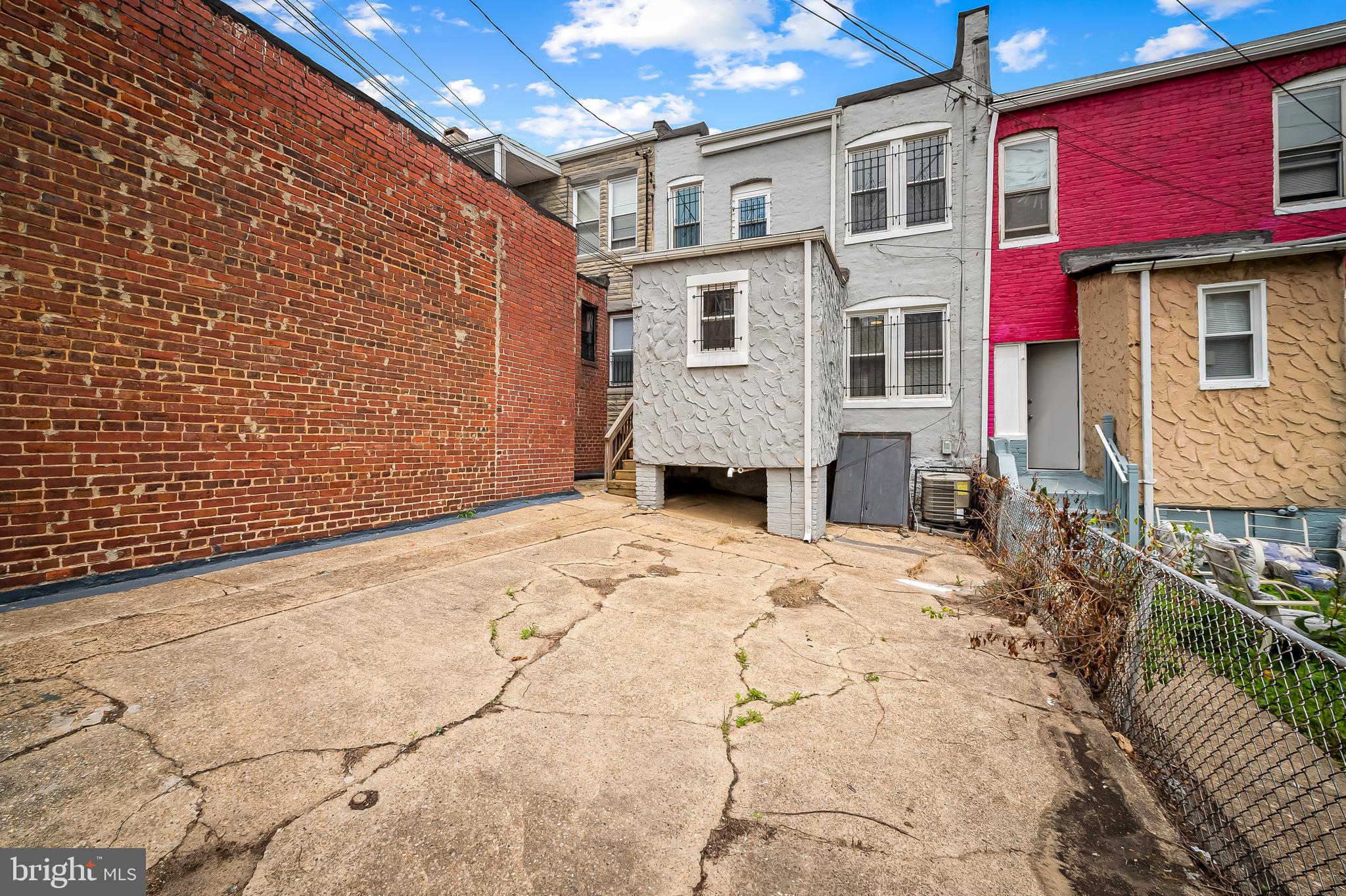 3003 Kentucky Avenue Baltimore, MD 21213 - Photo 31 of 32 a view of a backyard with a wooden fence