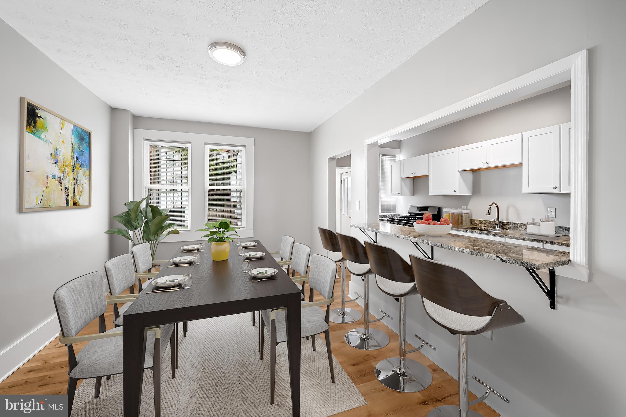 3003 Kentucky Avenue Baltimore, MD 21213 - Photo 8 of 32 a view of a dining room with furniture and window