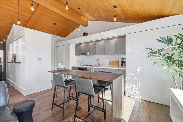 a bedroom with a bed and a table in it