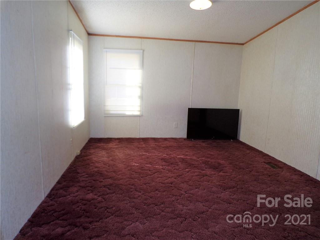 5230 Startown Road Newton, NC 28658 - Photo 14 of 16 wooden floor in an empty room