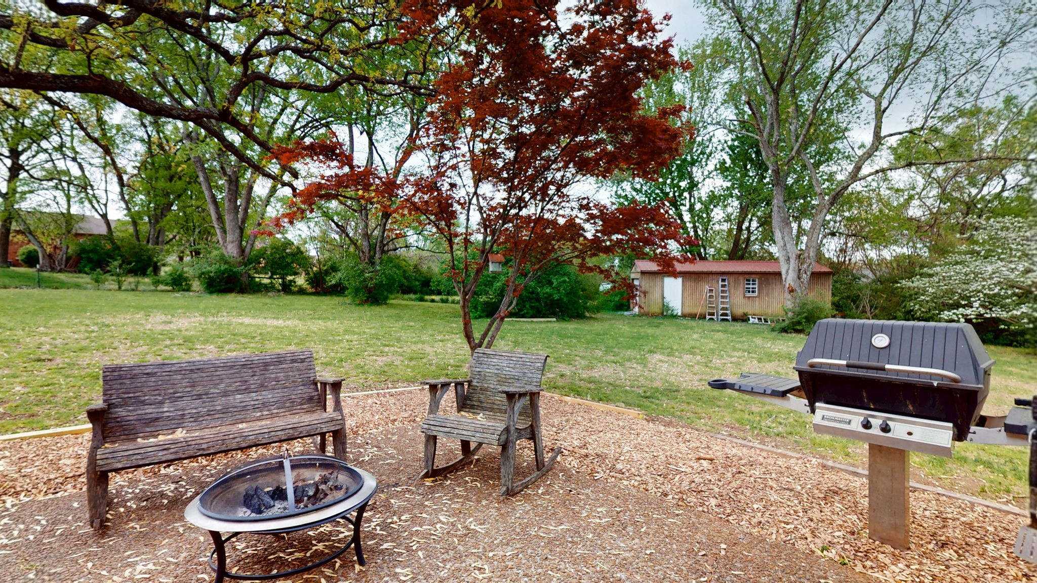 463 Walton Ferry Road Hendersonville, TN 37075 - Photo 43 of 54 a view of a backyard with sitting area furniture and a fire pit