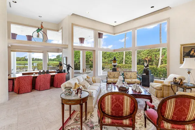 a bathroom with a sink toilet and a mirror