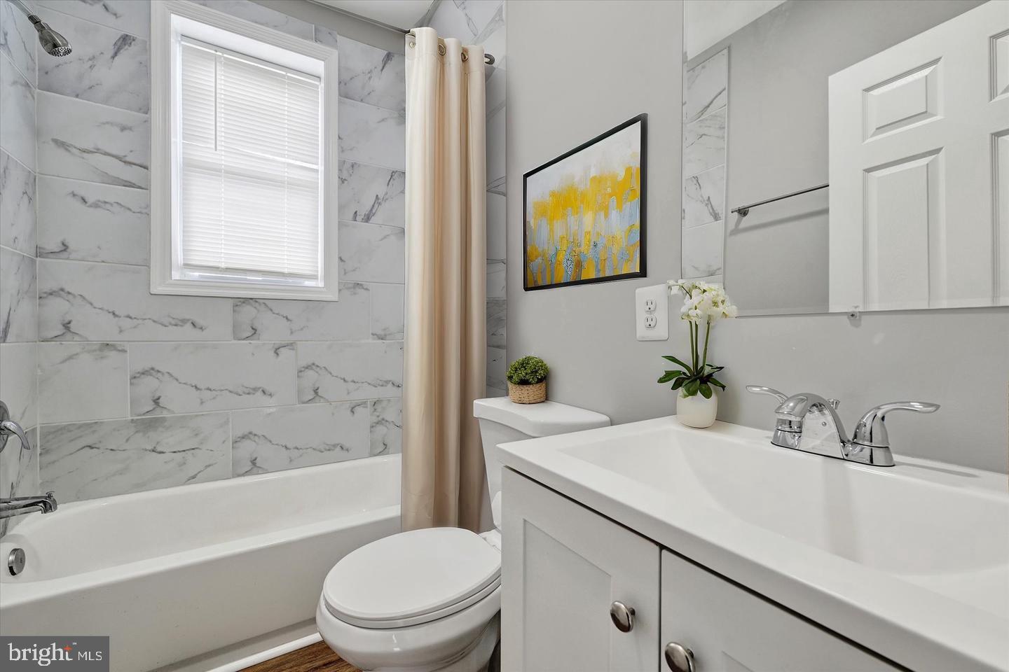 2706 East Chase Street Baltimore, MD 21213 - Photo 12 of 16 Upper lever bedroom virtually staged