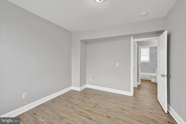 wooden floor in a room with a gallery