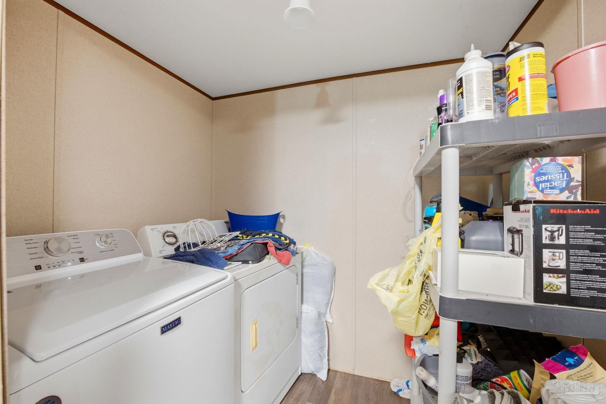 3338 Bob Tolbert Road Navarre, FL 32566 - Photo 21 of 29 a utility room with dryer and washer