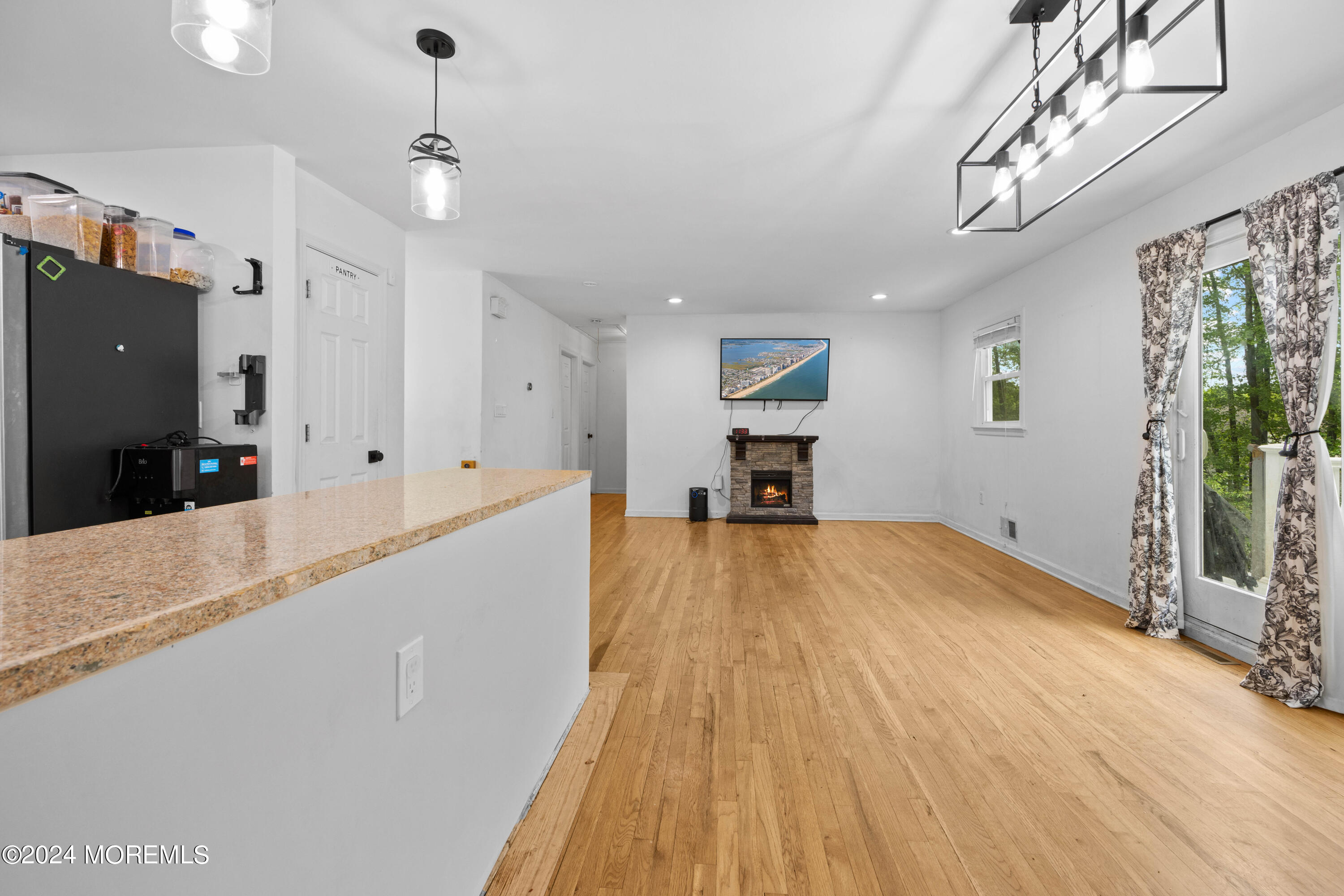 429 Cottrell Road Matawan, NJ 07747 - Photo 11 of 22 a view of kitchen with furniture and wooden floor