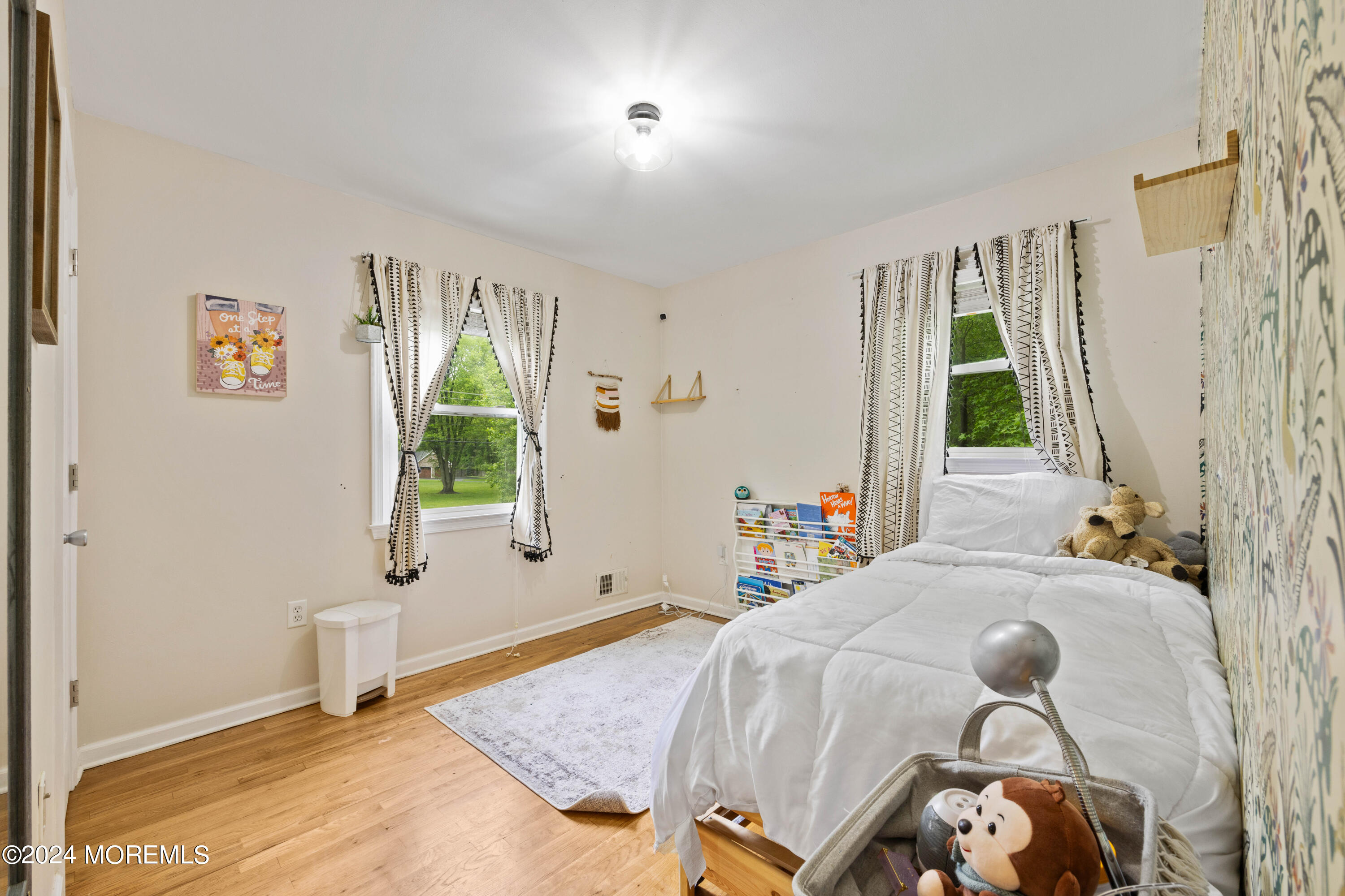 429 Cottrell Road Matawan, NJ 07747 - Photo 4 of 22 a bedroom with a bed and a window
