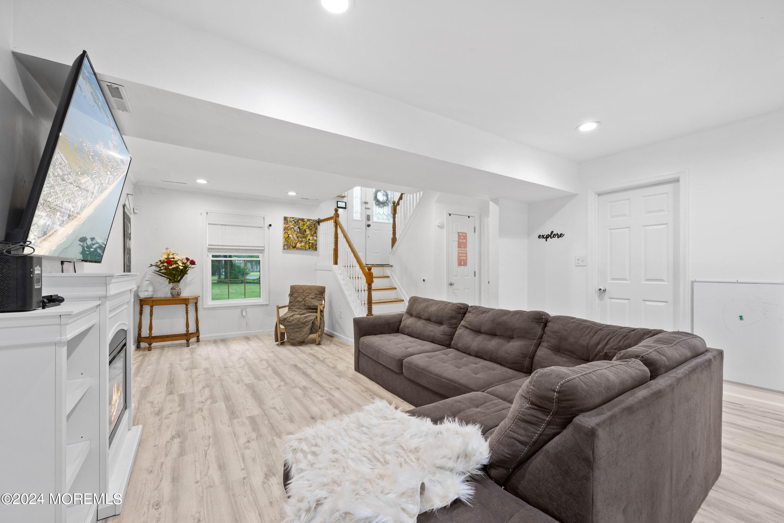 429 Cottrell Road Matawan, NJ 07747 - Photo 9 of 22 a living room with furniture and wooden floor