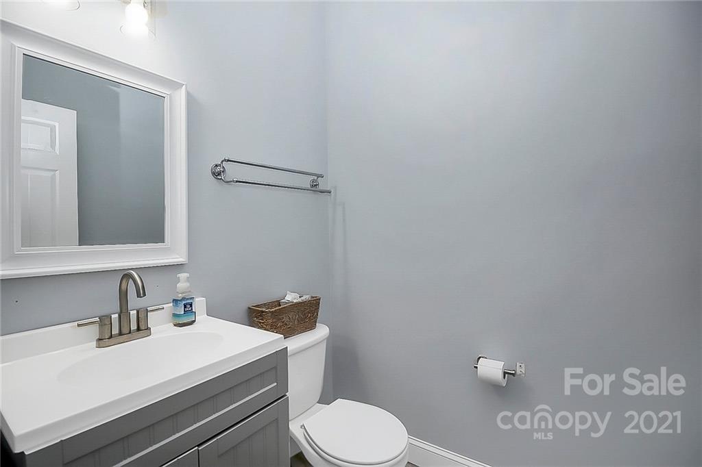 7769 East Berkeley Road Denver, NC 28037 - Photo 15 of 31 a bathroom with a sink and a toilet