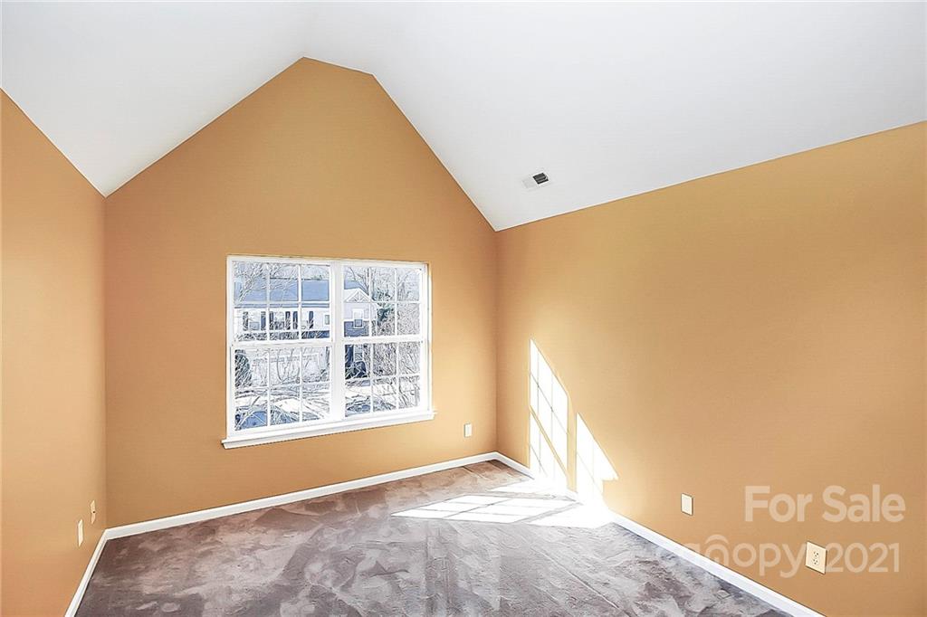 7769 East Berkeley Road Denver, NC 28037 - Photo 28 of 31 a view of an empty room with a window