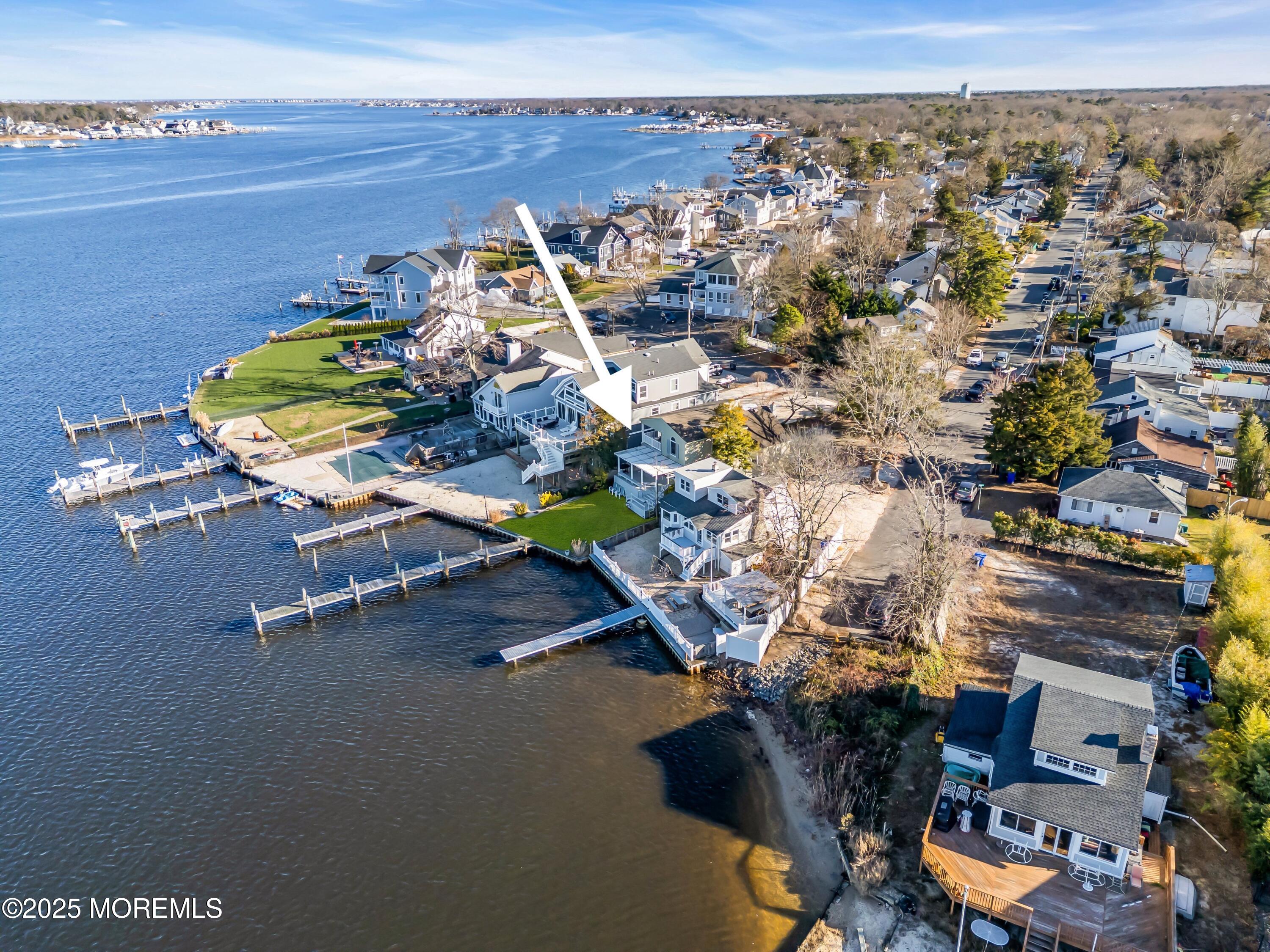 3 Metedeconk Road Brick, NJ 08723 - Photo 28 of 28 an aerial view of a house with a yard pool table and chairs
