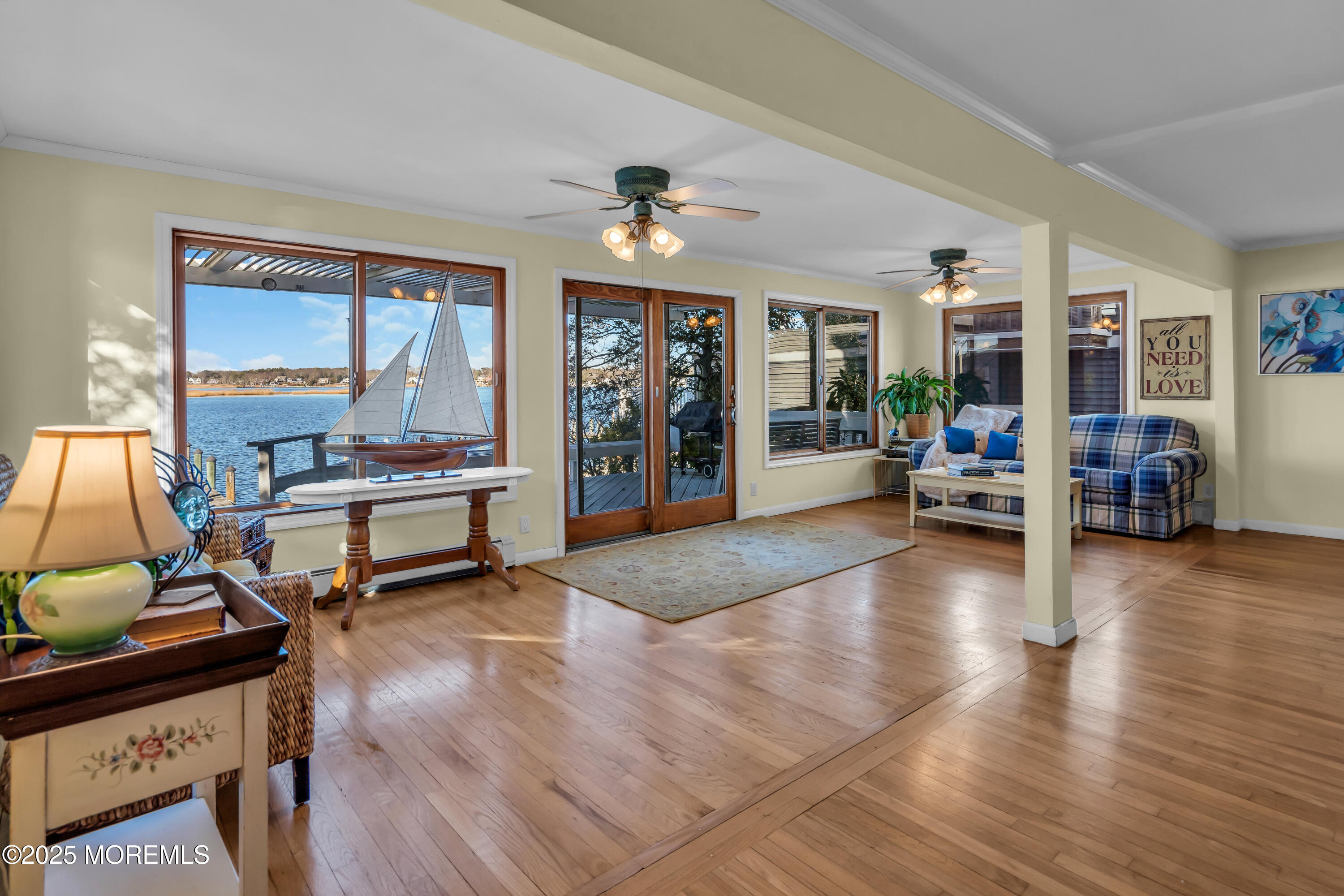 3 Metedeconk Road Brick, NJ 08723 - Photo 4 of 28 a living room with furniture a piano and a flat screen tv