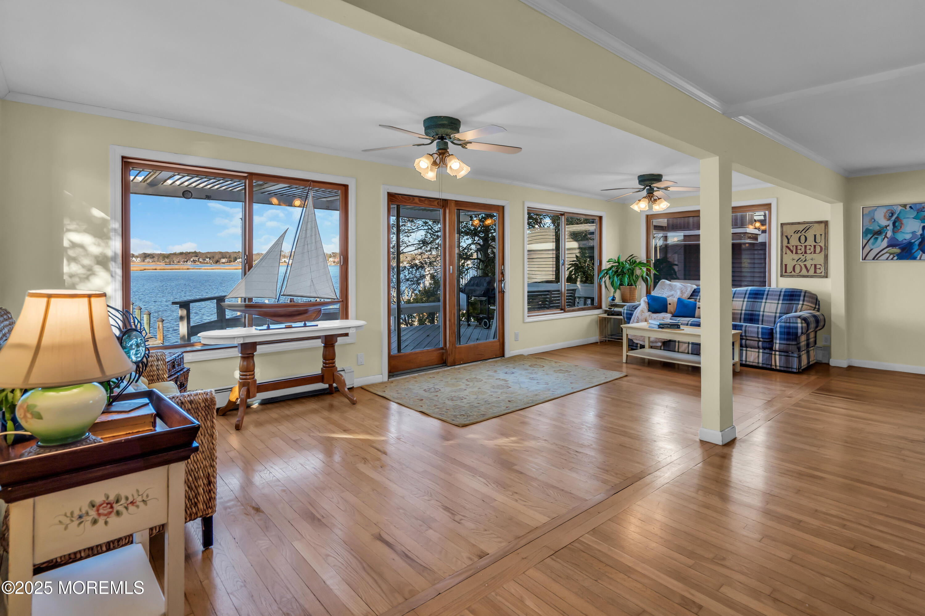 3 Metedeconk Road Brick, NJ 08723 - Photo 7 of 28 a living room filled with furniture and a flat screen tv